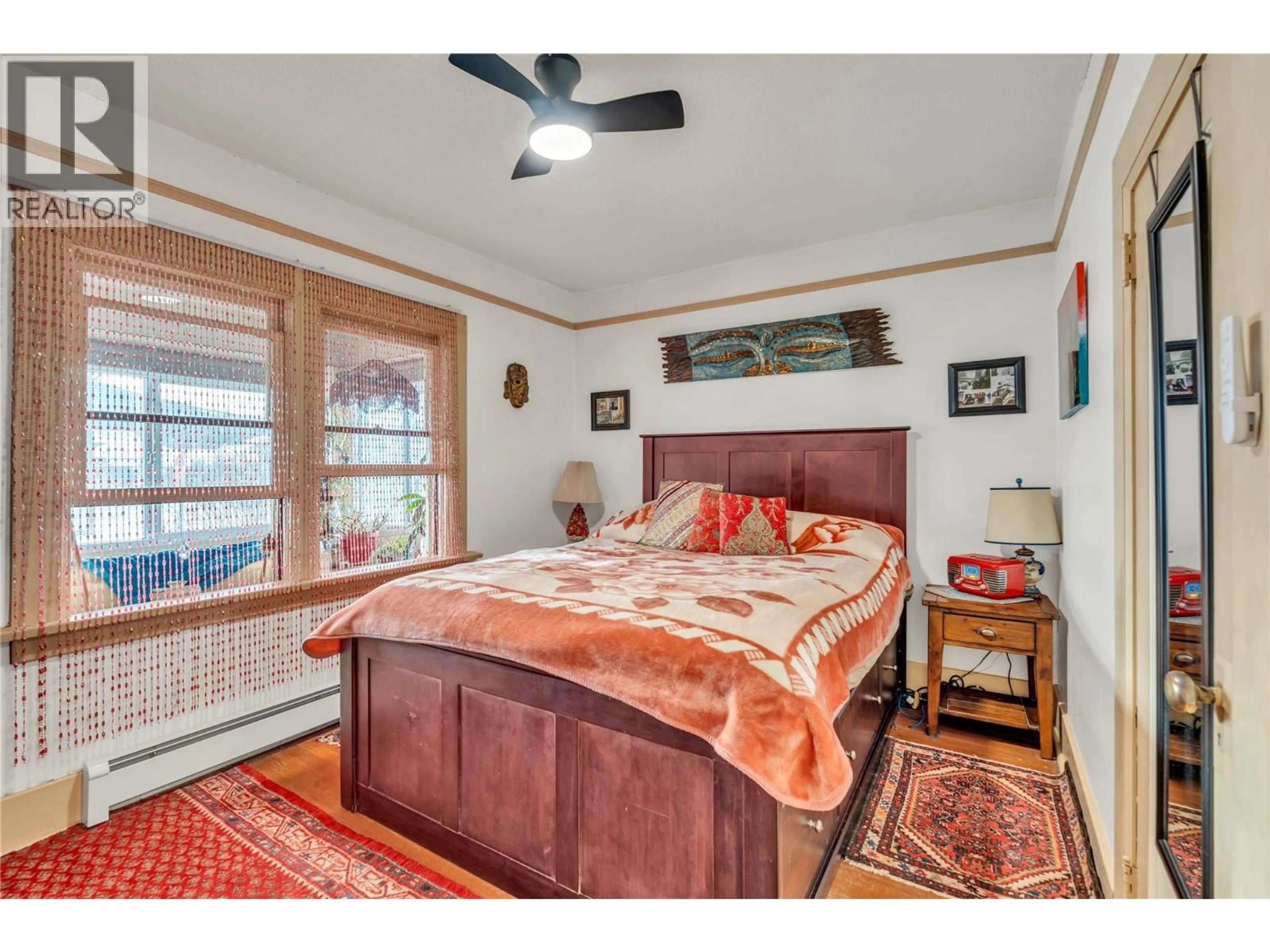 Bedroom with bed, wood/laminate floor for 45 FENCHURCH AVENUE, Princeton British Columbia V0X1W0