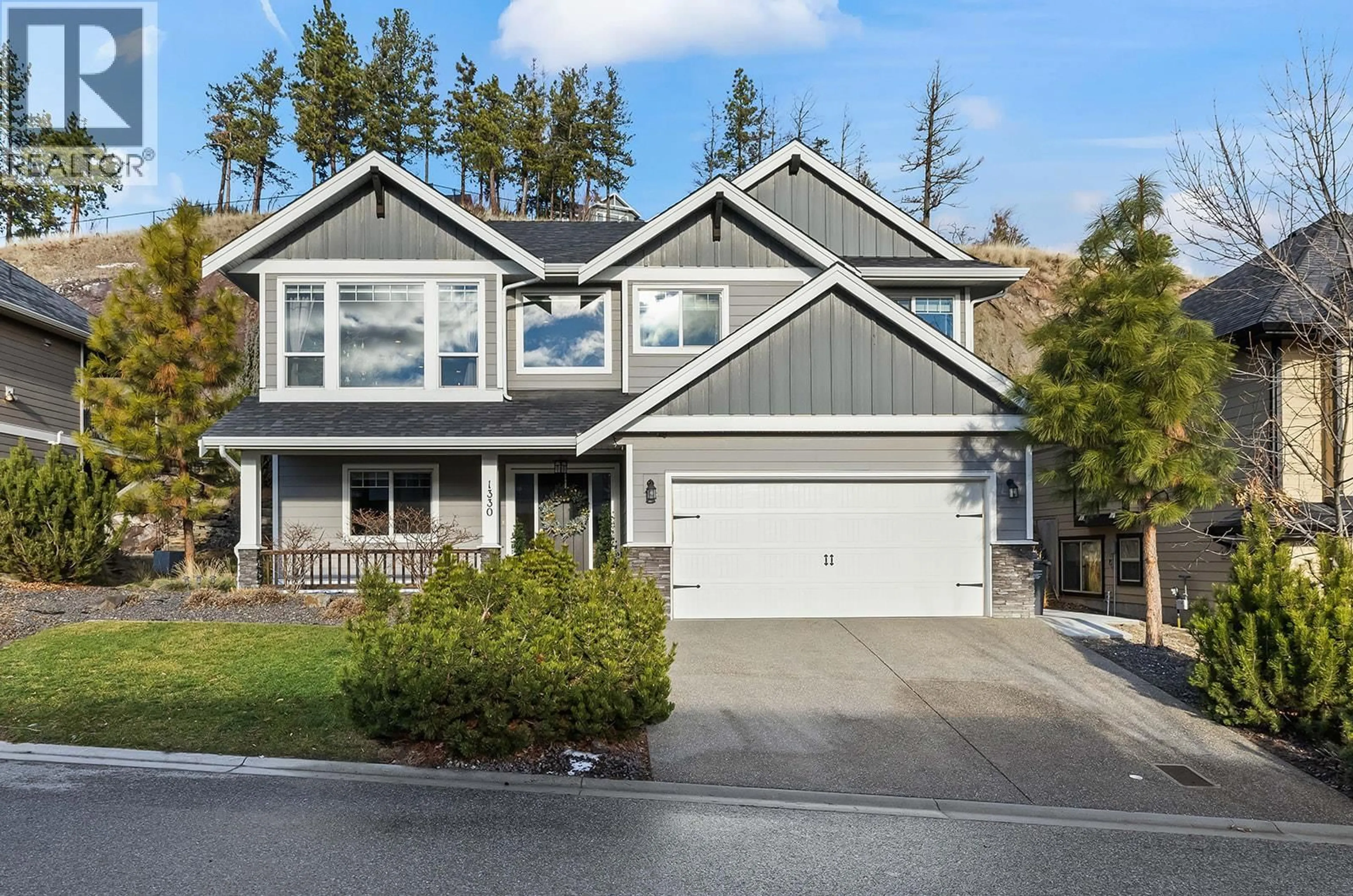 Home with vinyl exterior material, street for 1330 ROCKY POINT DRIVE, Kelowna British Columbia V1V2Z9