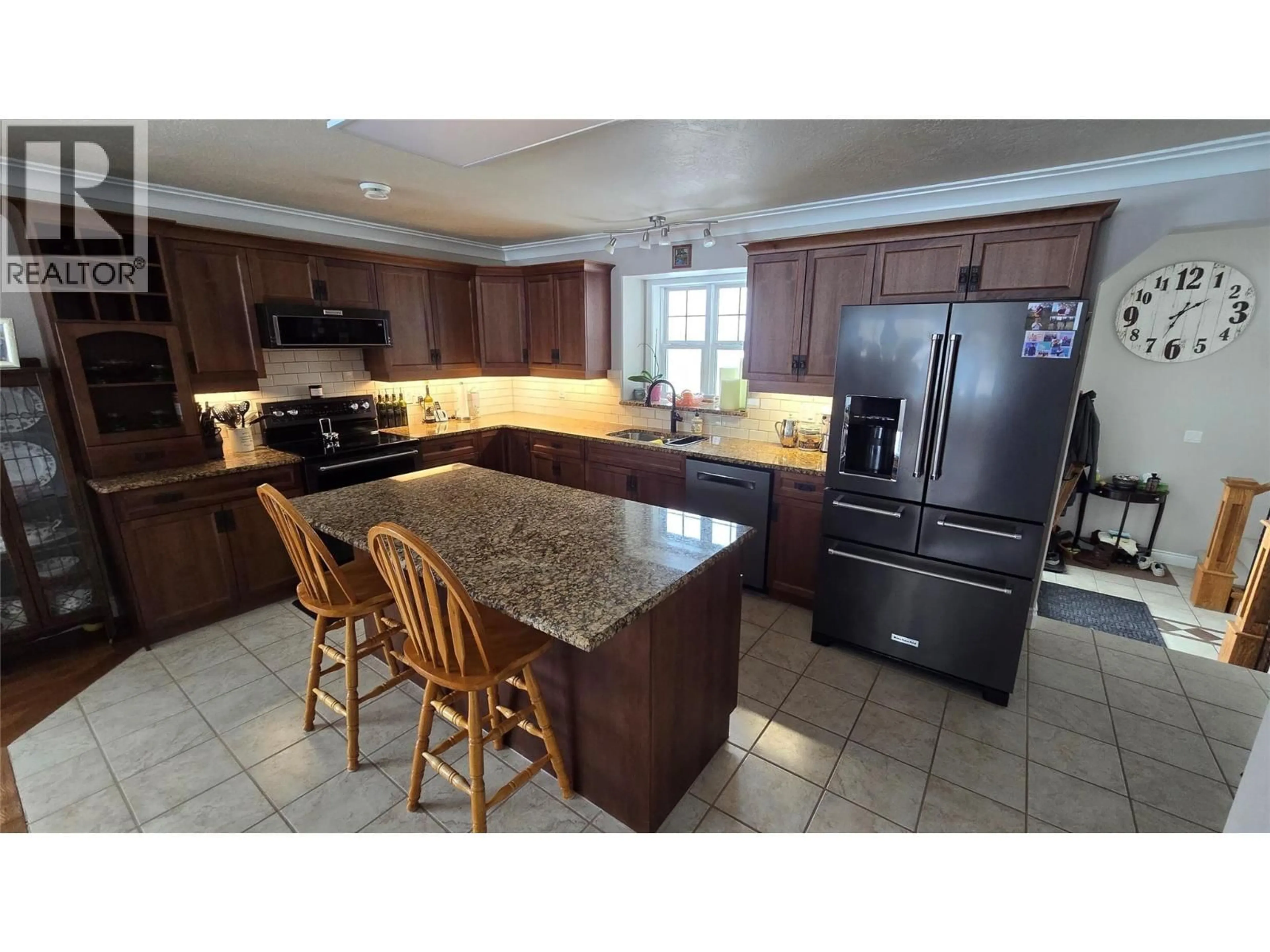 Open concept kitchen, ceramic/tile floor for 1820 110 AVENUE, Dawson Creek British Columbia V1G0A3