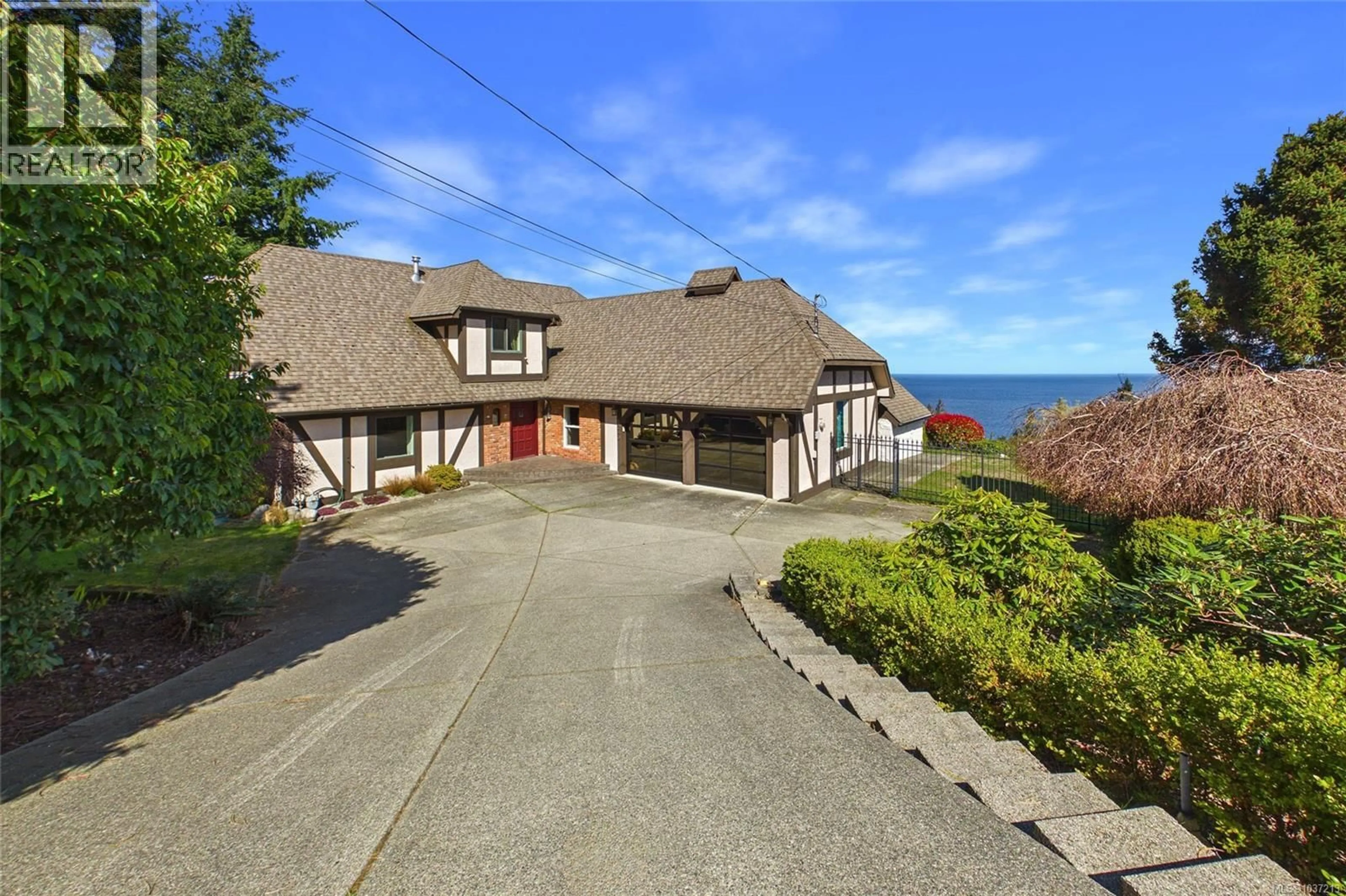 A pic from outside/outdoor area/front of a property/back of a property/a pic from drone, water/lake/river/ocean view for 5246 LOST LAKE ROAD, Nanaimo British Columbia V9T5E5