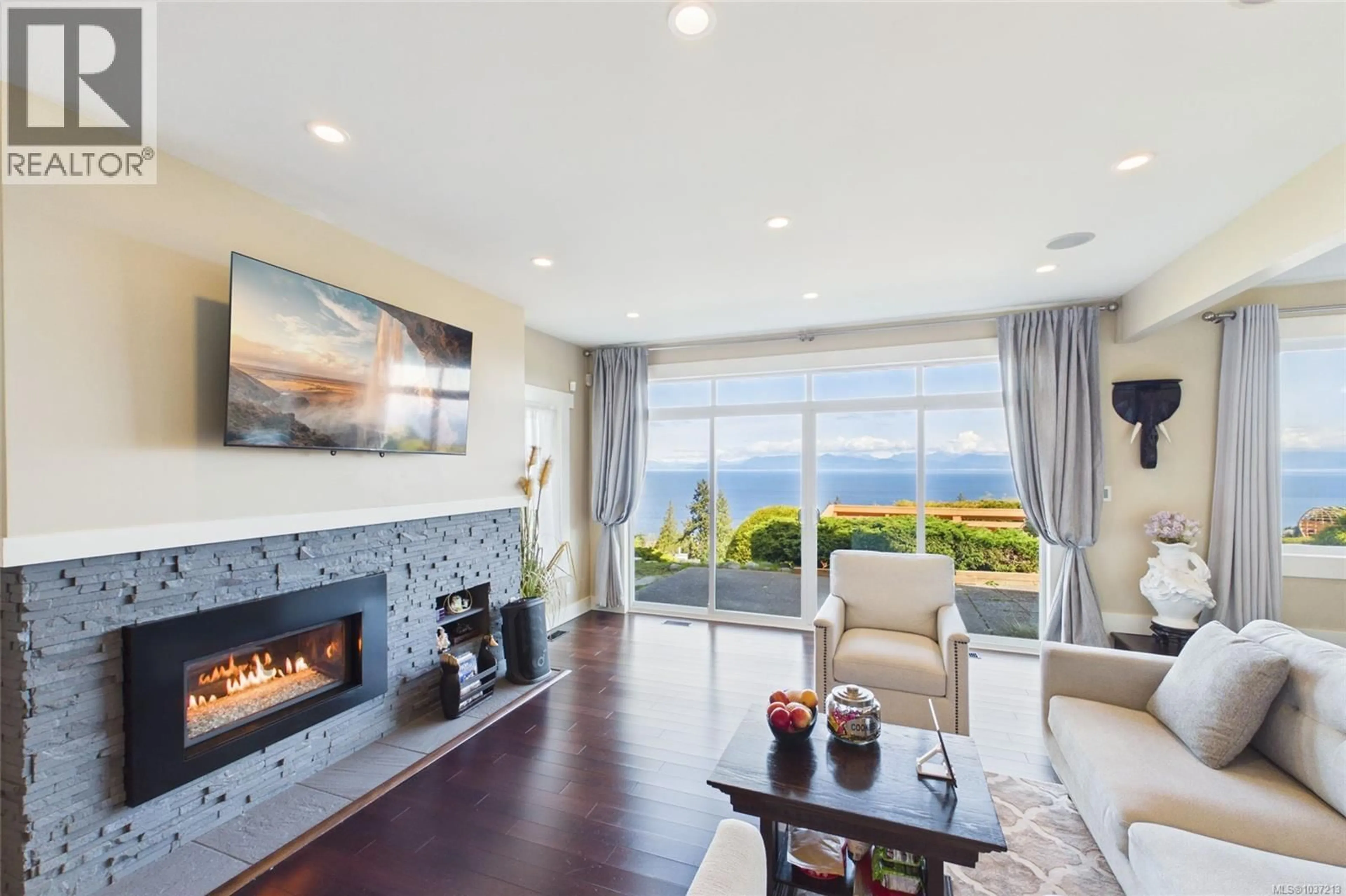 Living room with furniture, unknown for 5246 LOST LAKE ROAD, Nanaimo British Columbia V9T5E5