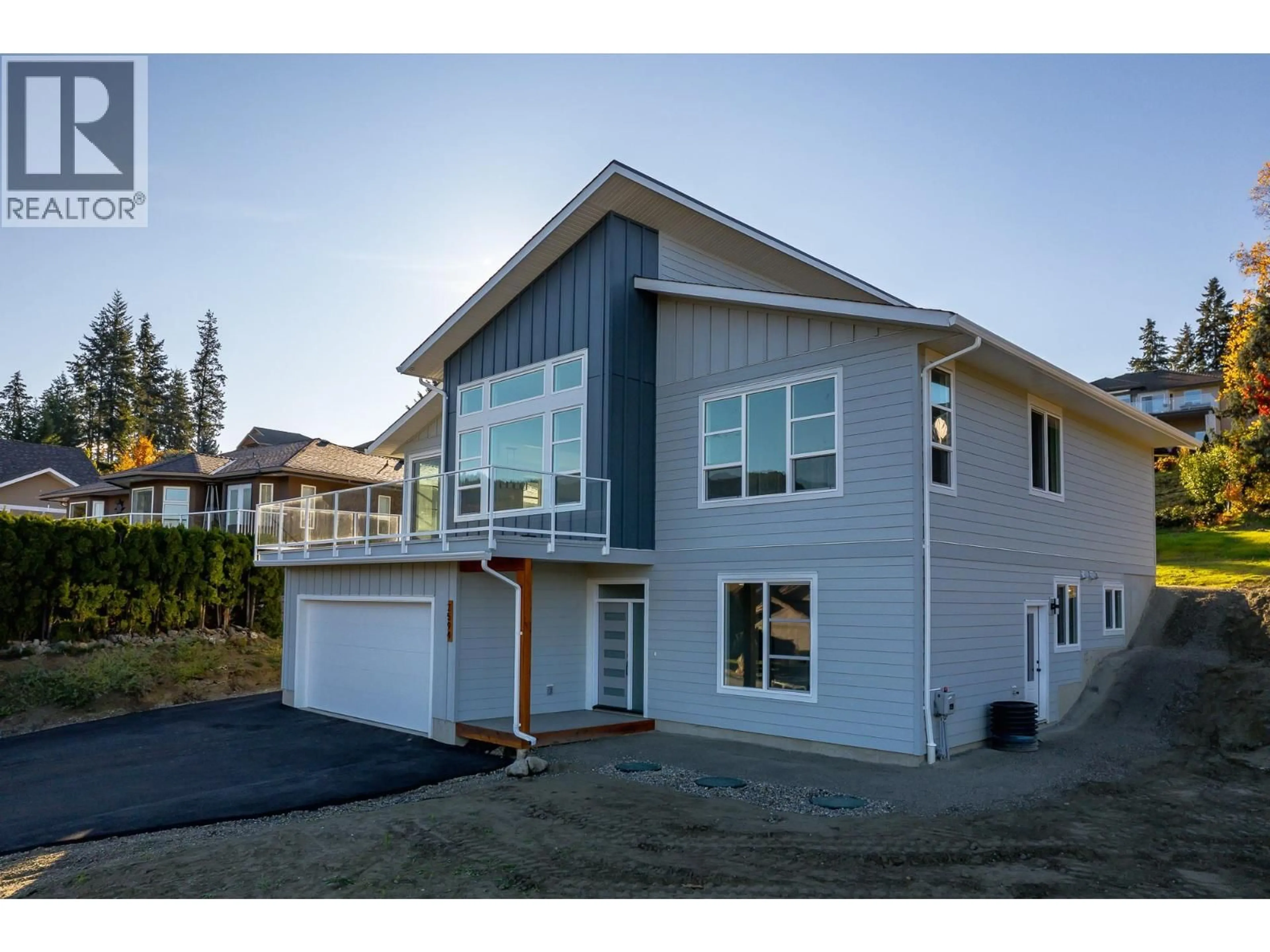 Home with vinyl exterior material, street for 2594 GRAND VIEW PLACE, Blind Bay British Columbia V0E1H2