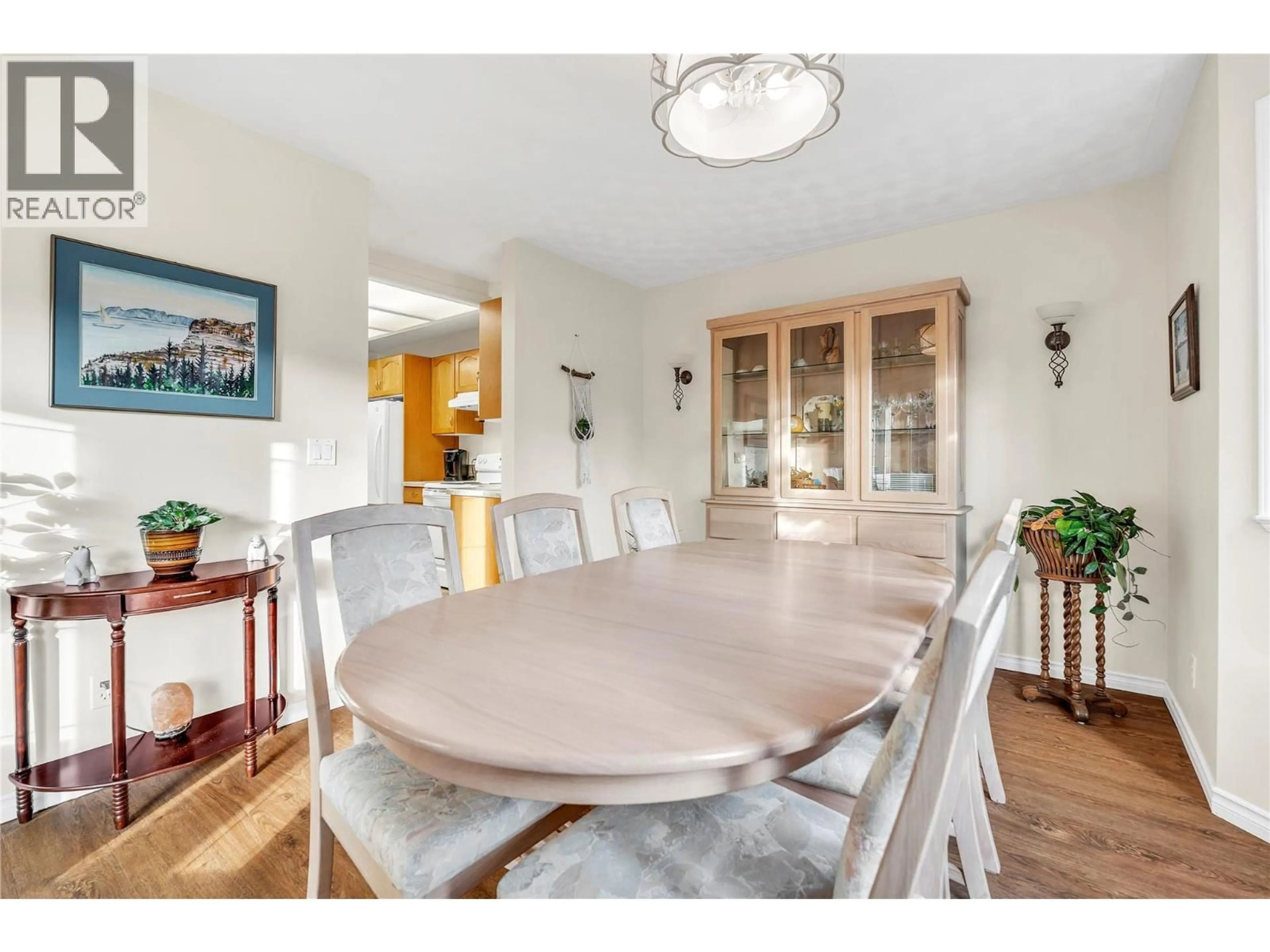 Dining room, wood/laminate floor for 107 - 8408 JUBILEE ROAD EAST, Summerland British Columbia V0H1Z5