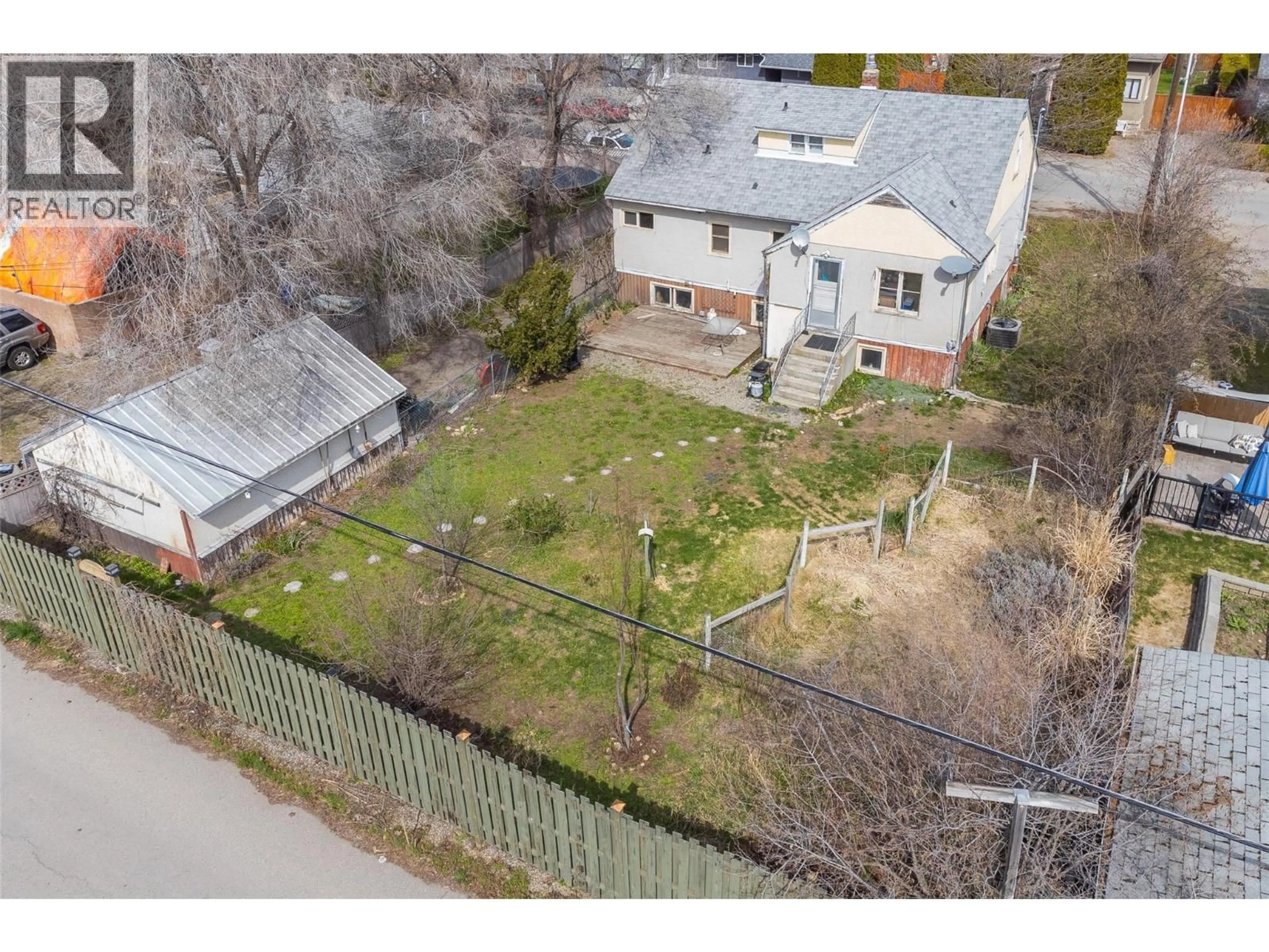A pic from outside/outdoor area/front of a property/back of a property/a pic from drone, street for 245 PONTO ROAD, Kelowna British Columbia V1X2G2
