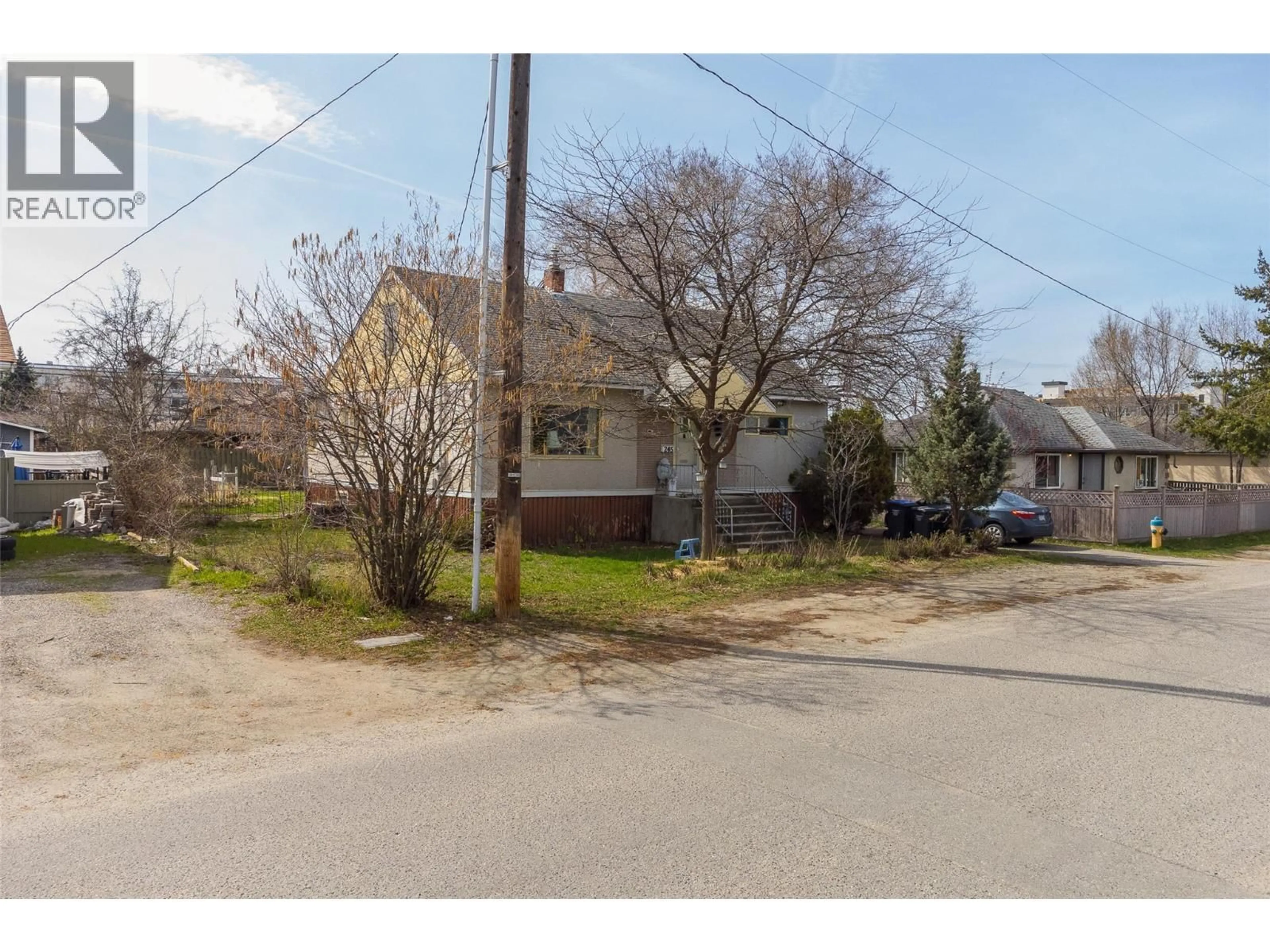 A pic from outside/outdoor area/front of a property/back of a property/a pic from drone, street for 245 PONTO ROAD, Kelowna British Columbia V1X2G2