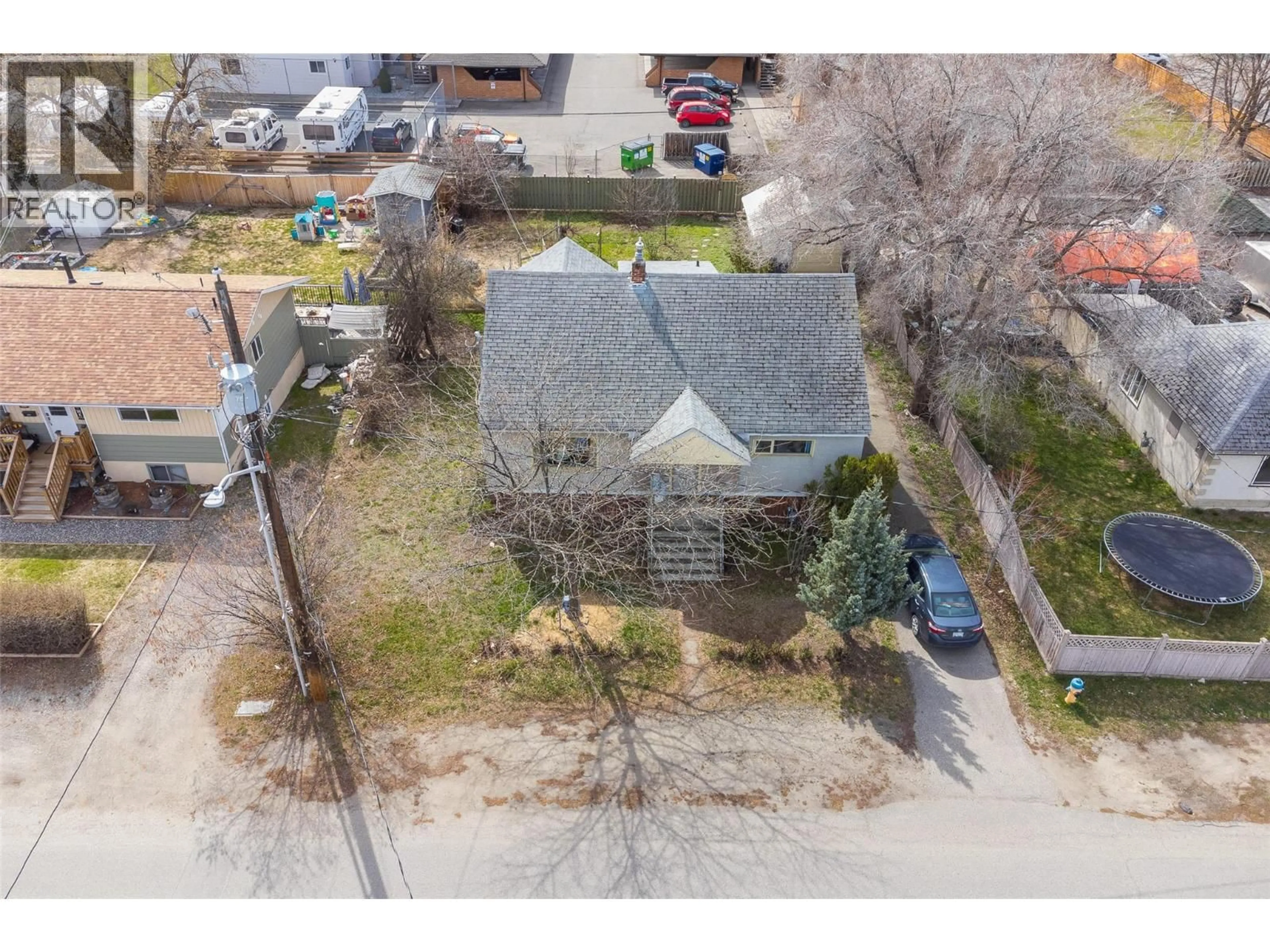 A pic from outside/outdoor area/front of a property/back of a property/a pic from drone, street for 245 PONTO ROAD, Kelowna British Columbia V1X2G2