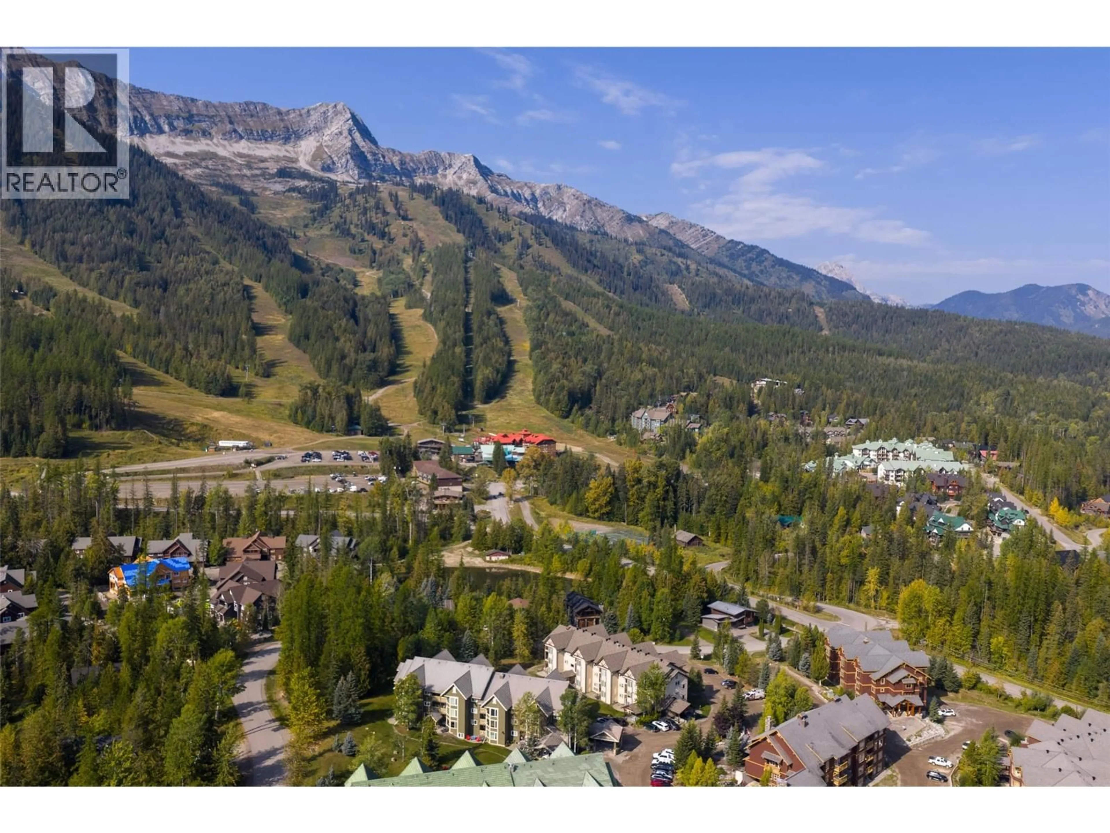 A pic from outside/outdoor area/front of a property/back of a property/a pic from drone, mountain view for 312 - 4559 TIMBERLINE CRESCENT, Fernie British Columbia V0B1M6