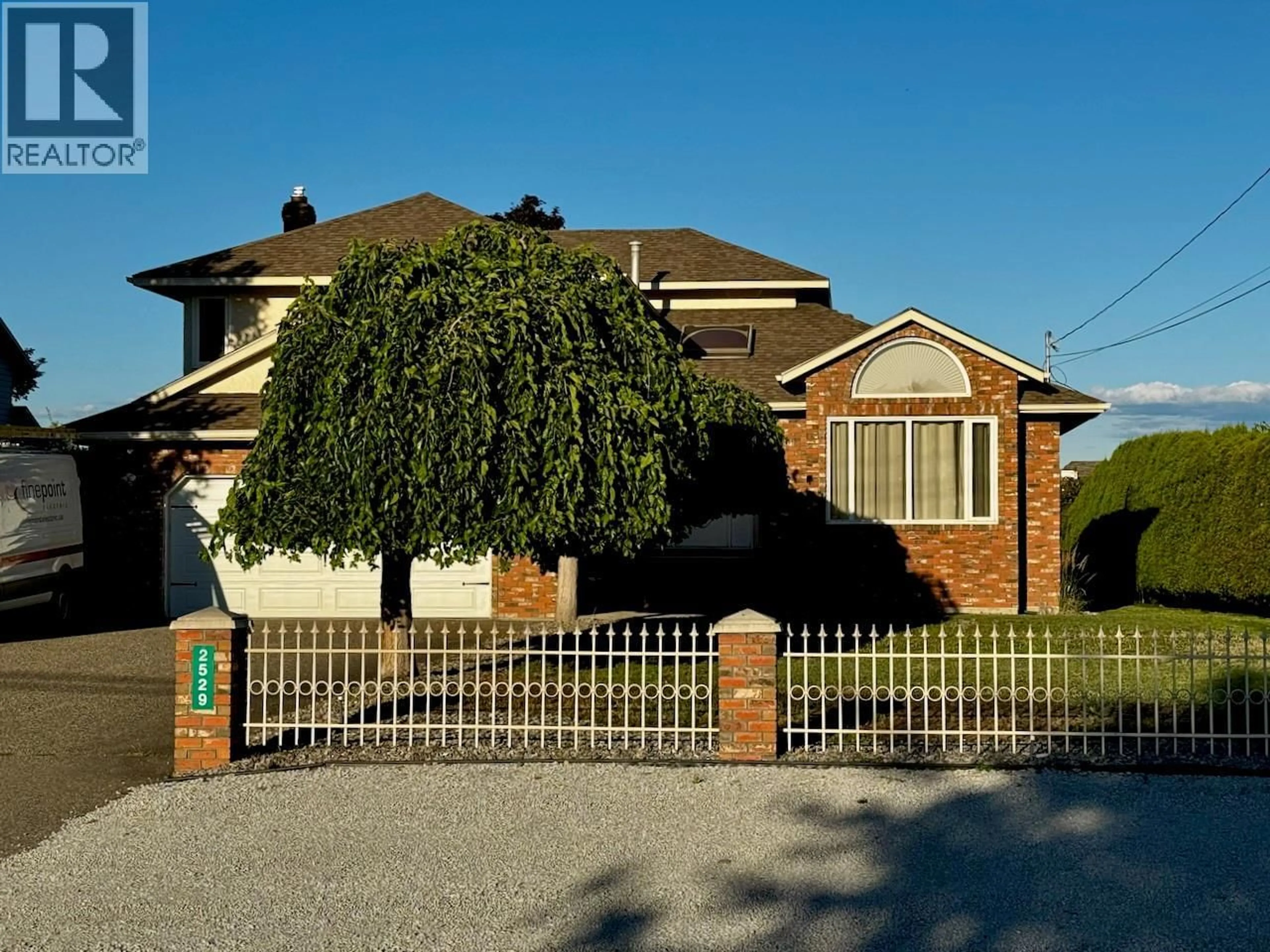 Home with brick exterior material, street for 2529 THACKER DRIVE, West Kelowna British Columbia V1Z1W2