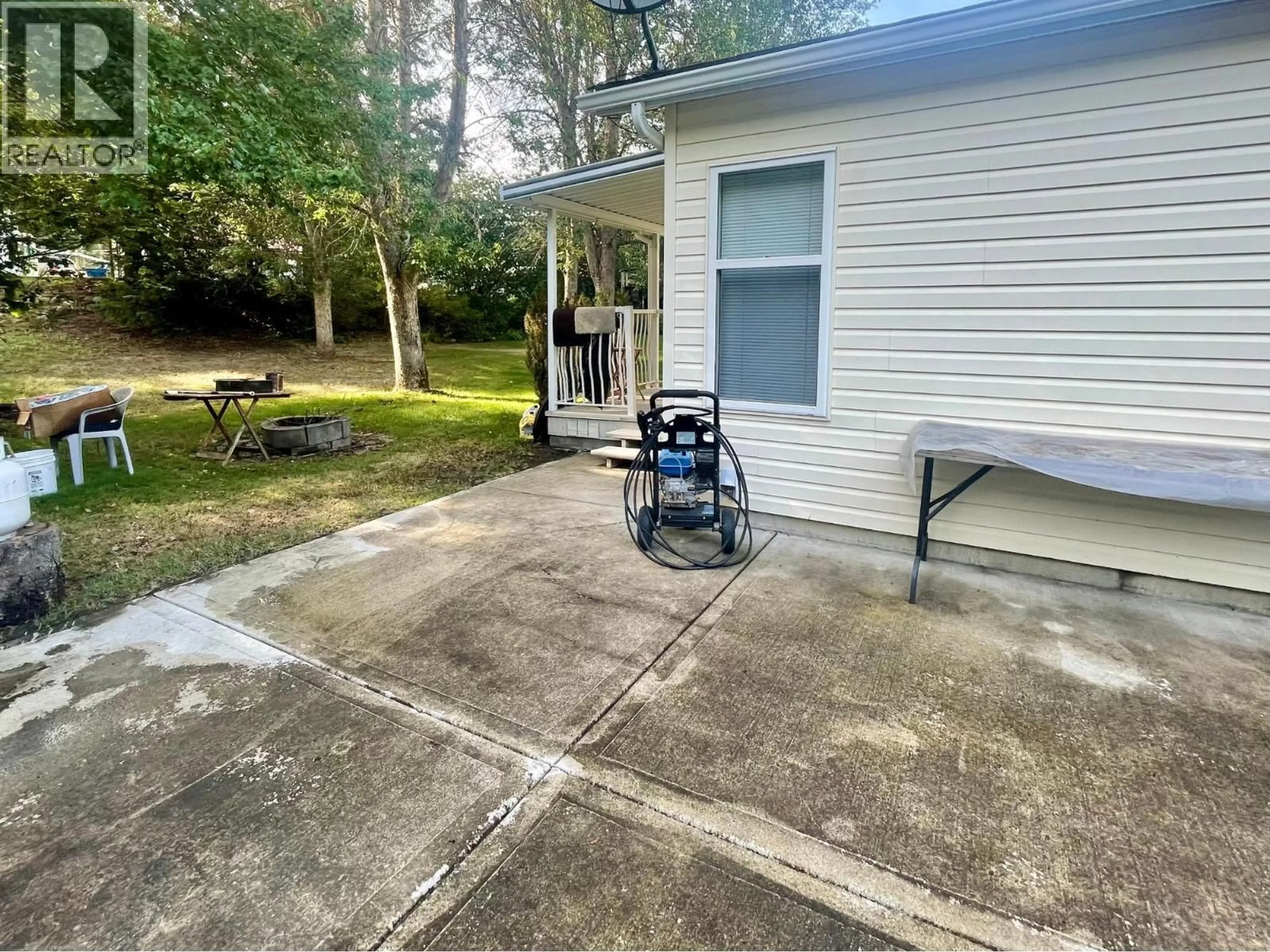 A pic from outside/outdoor area/front of a property/back of a property/a pic from drone, unknown for 11 - 1500 NEIMI ROAD, Christina Lake British Columbia V0H1E2