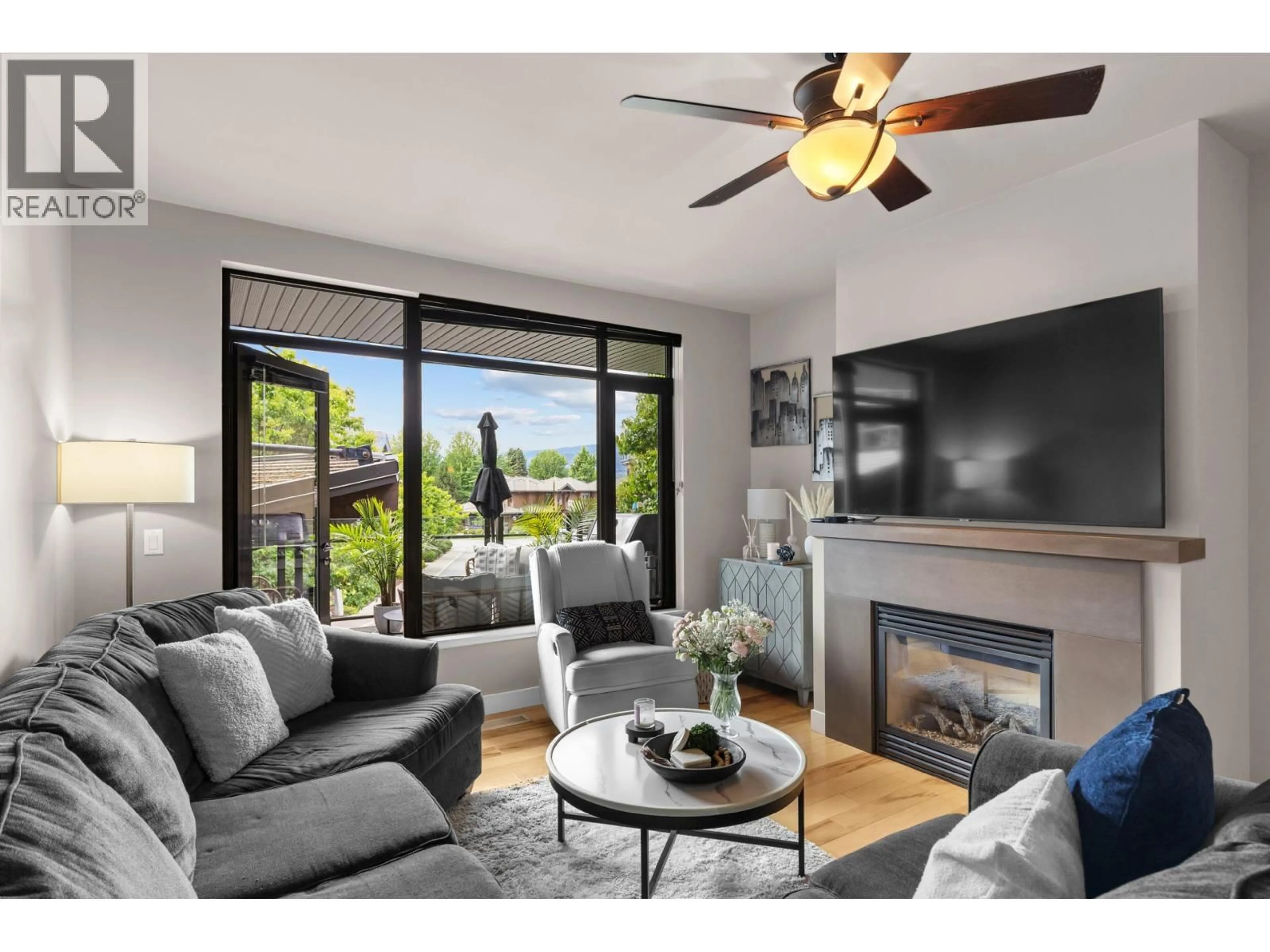 Living room with furniture, unknown for 201 - 600 SARSONS ROAD, Kelowna British Columbia V1W5H5