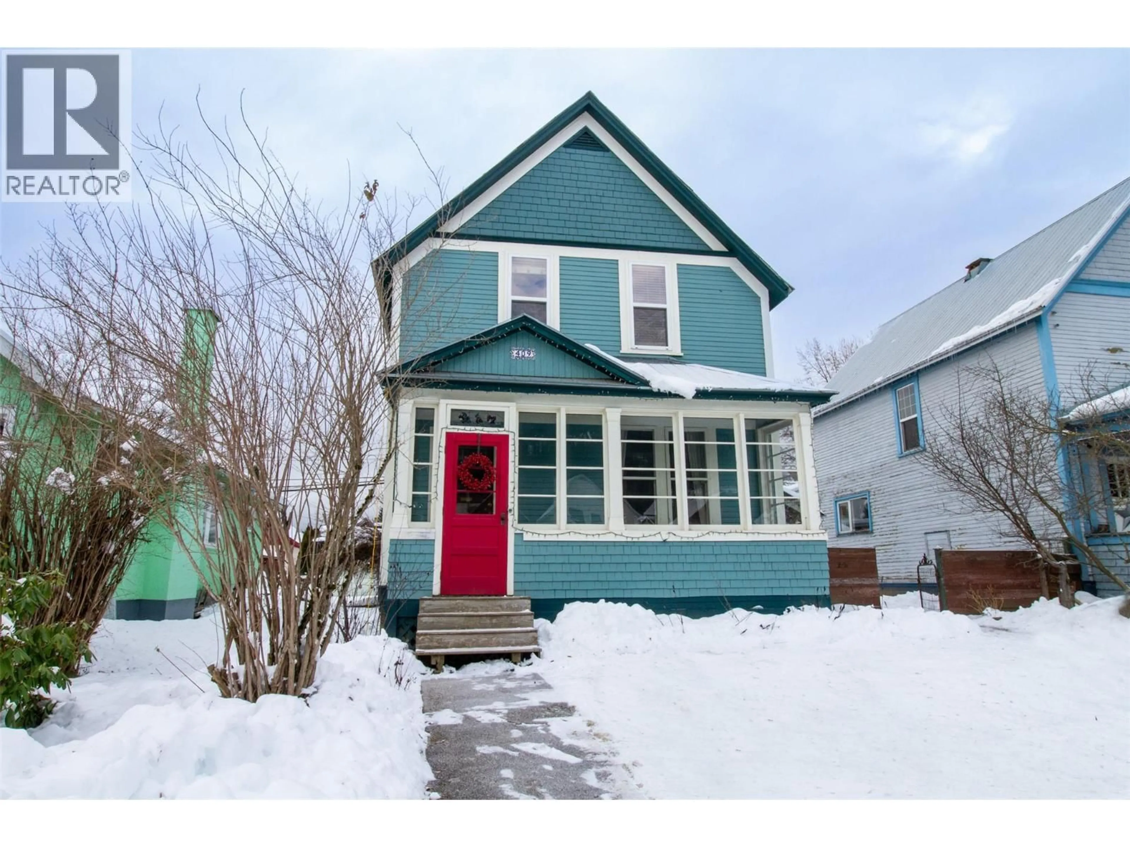 Home with vinyl exterior material, street for 409 THIRD STREET EAST, Revelstoke British Columbia V0E2S0