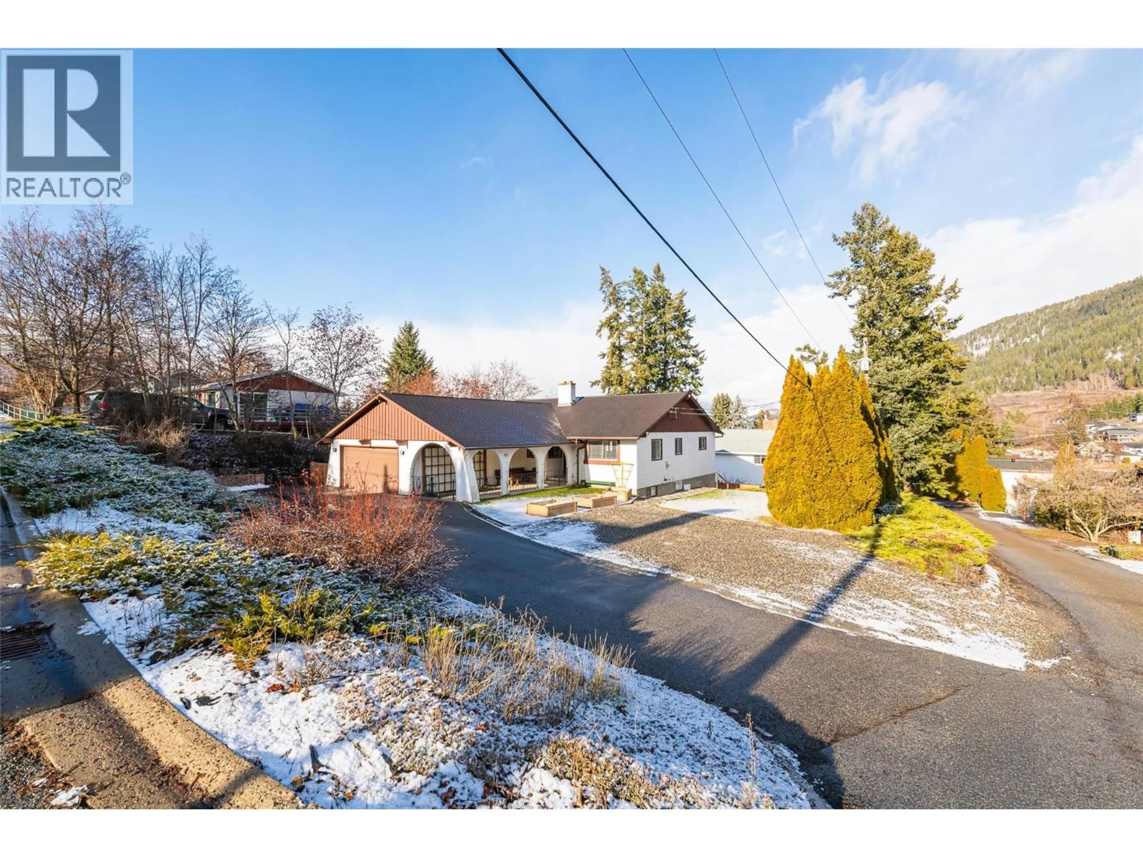 A pic from outside/outdoor area/front of a property/back of a property/a pic from drone, street for 703 11TH AVENUE NORTH, Creston British Columbia V0B1G4