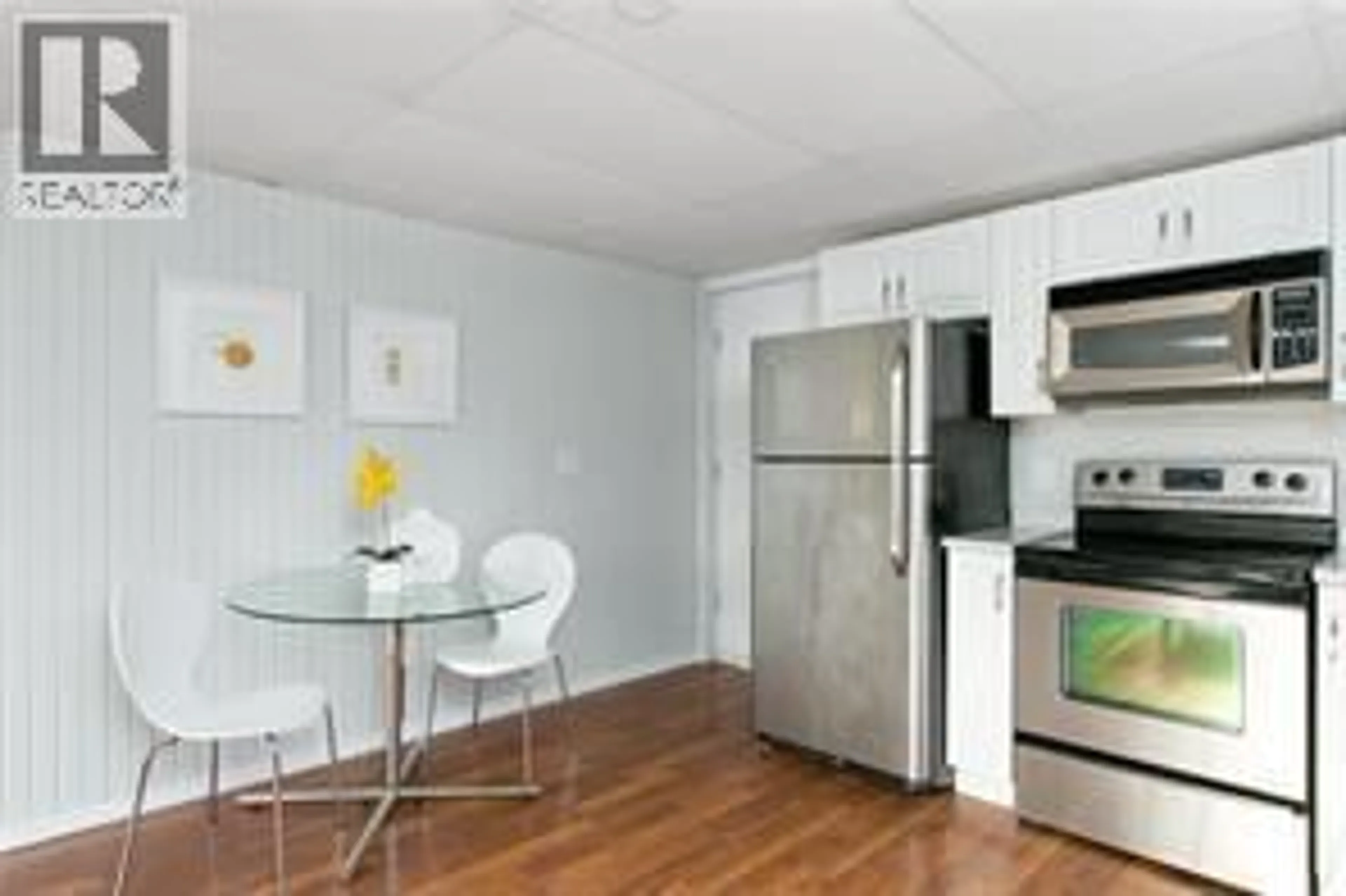 Standard kitchen, wood/laminate floor for 130 DYSART ROAD, Kelowna British Columbia V1X3R1