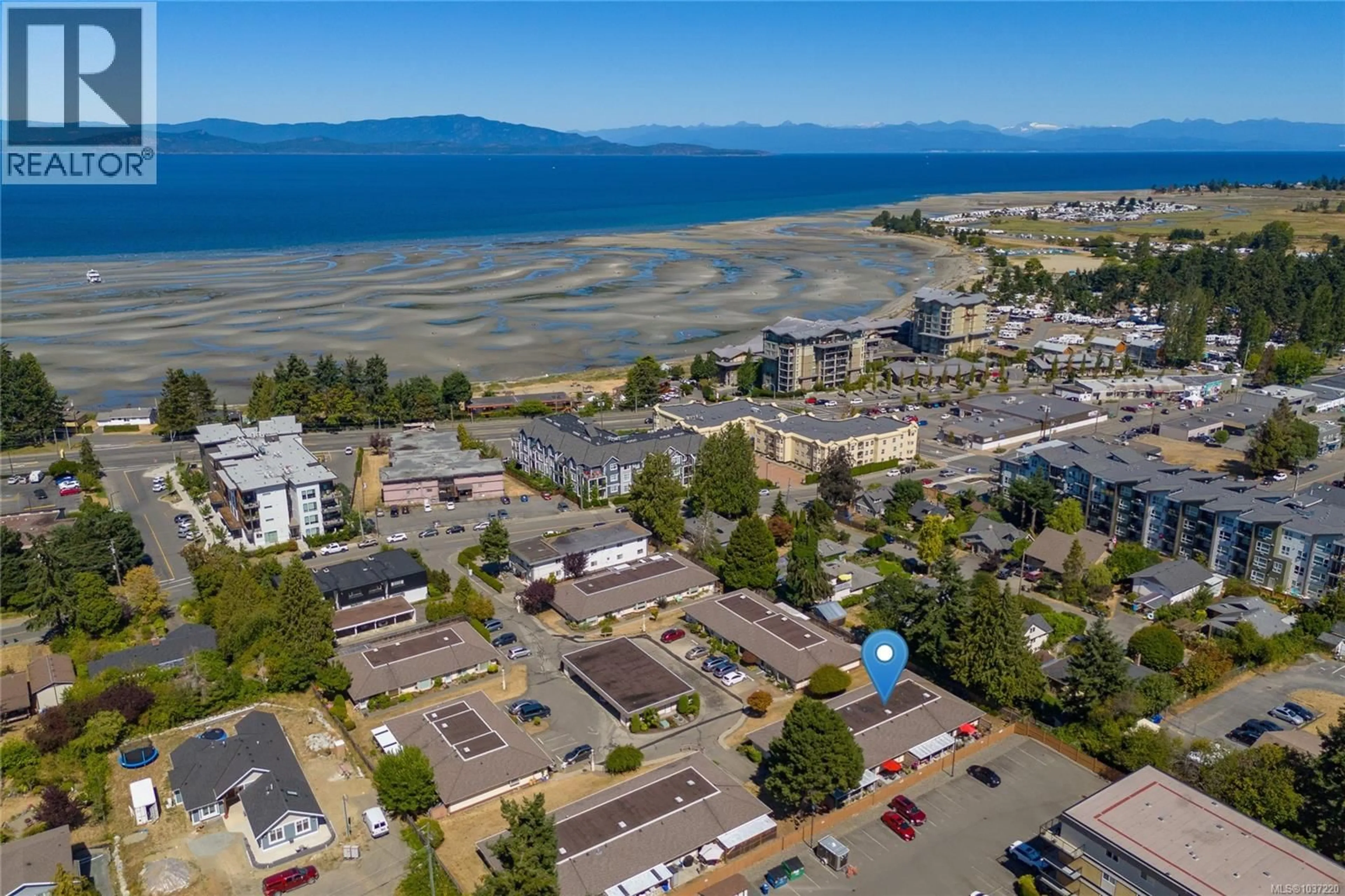 A pic from outside/outdoor area/front of a property/back of a property/a pic from drone, water/lake/river/ocean view for 2 - 100 ABBEY LANE, Parksville British Columbia V9P1N4