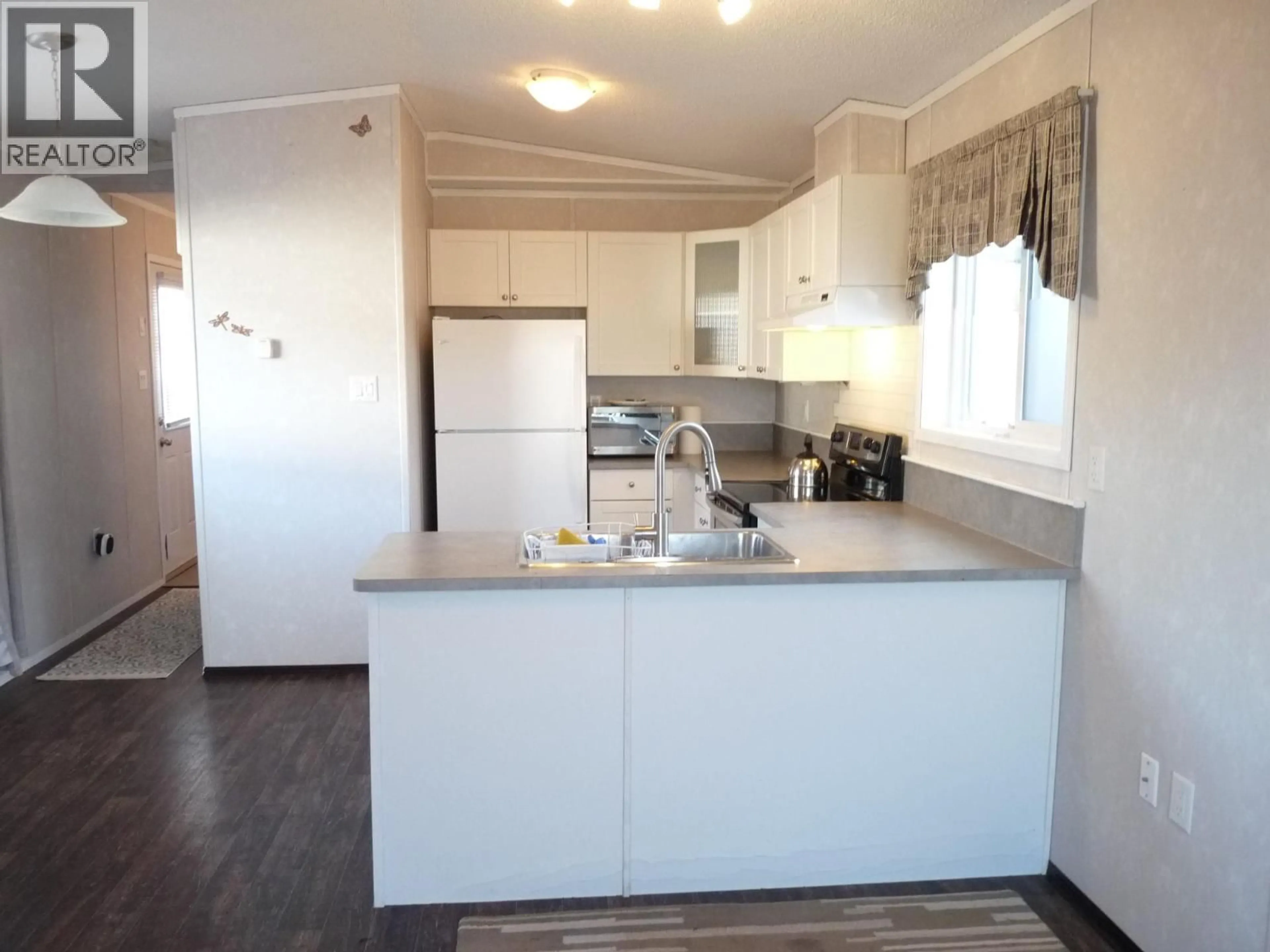 Standard kitchen, wood/laminate floor for 56 - 771 ATHABASCA STREET EAST, Kamloops British Columbia V2H1C8