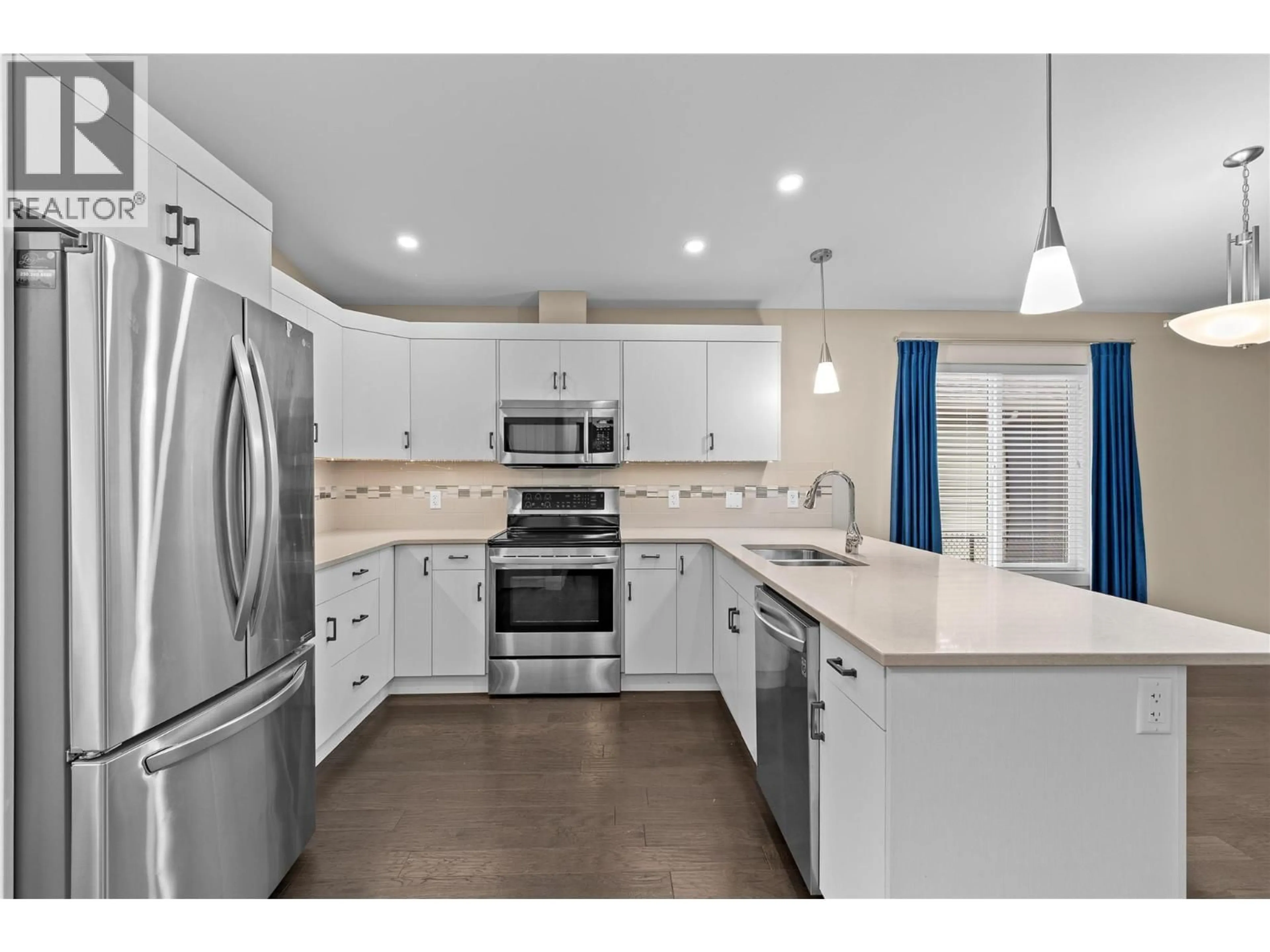 Open concept kitchen, ceramic/tile floor for 63 - 2100 55 AVENUE, Vernon British Columbia V1T9Y6