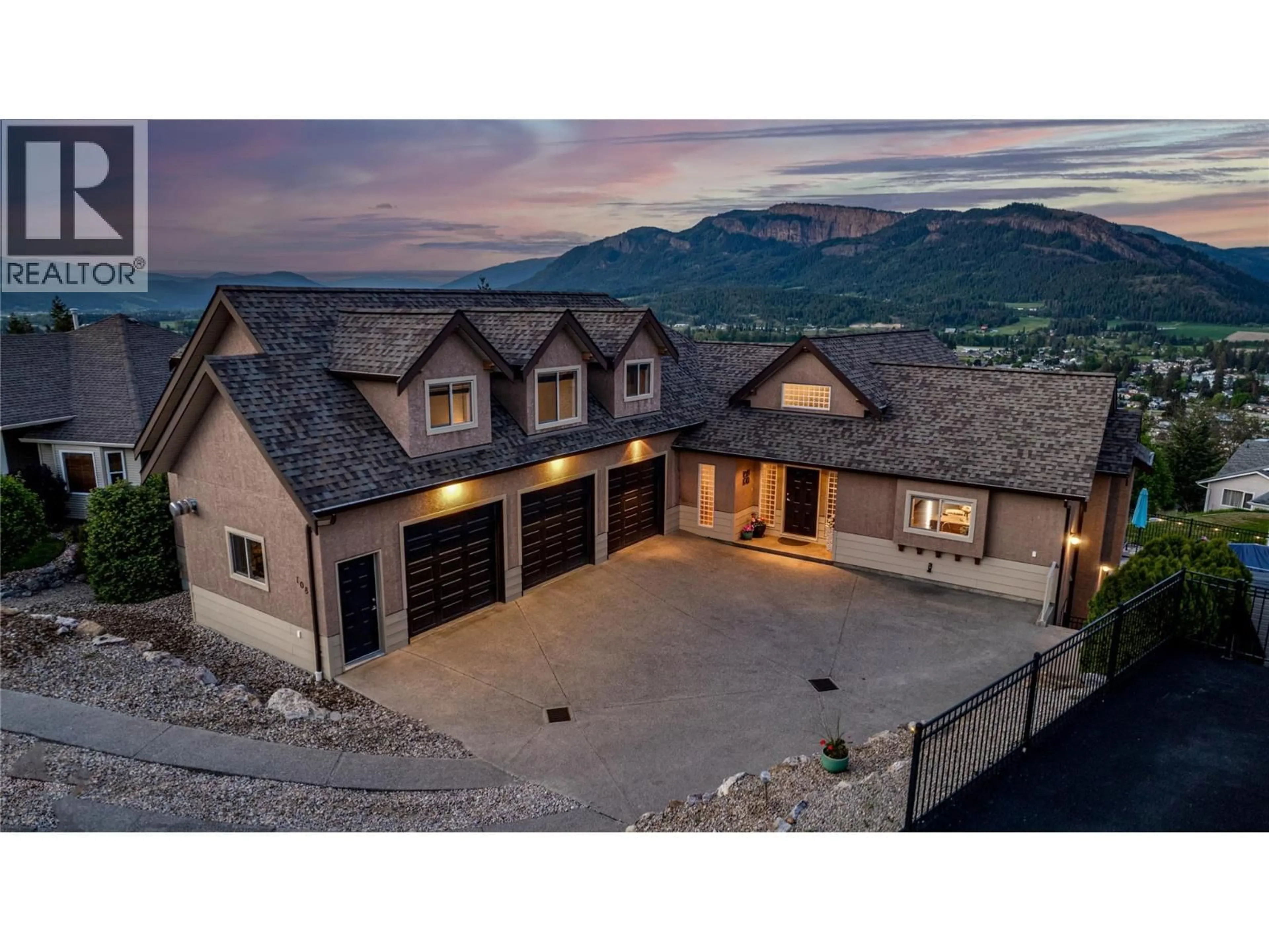 A pic from outside/outdoor area/front of a property/back of a property/a pic from drone, mountain view for 108 RED ROCK CRESCENT, Enderby British Columbia V0E1V1