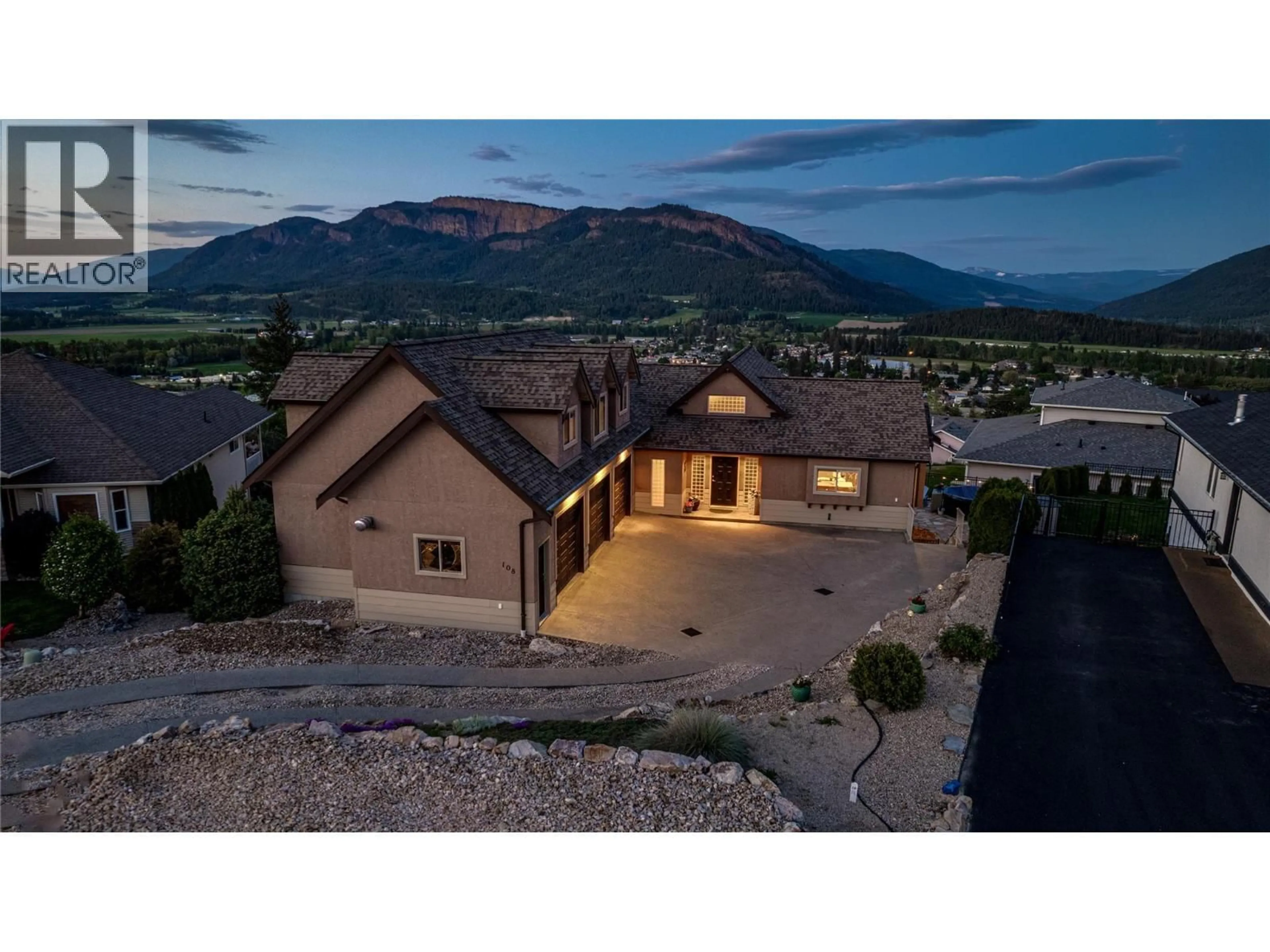 A pic from outside/outdoor area/front of a property/back of a property/a pic from drone, mountain view for 108 RED ROCK CRESCENT, Enderby British Columbia V0E1V1