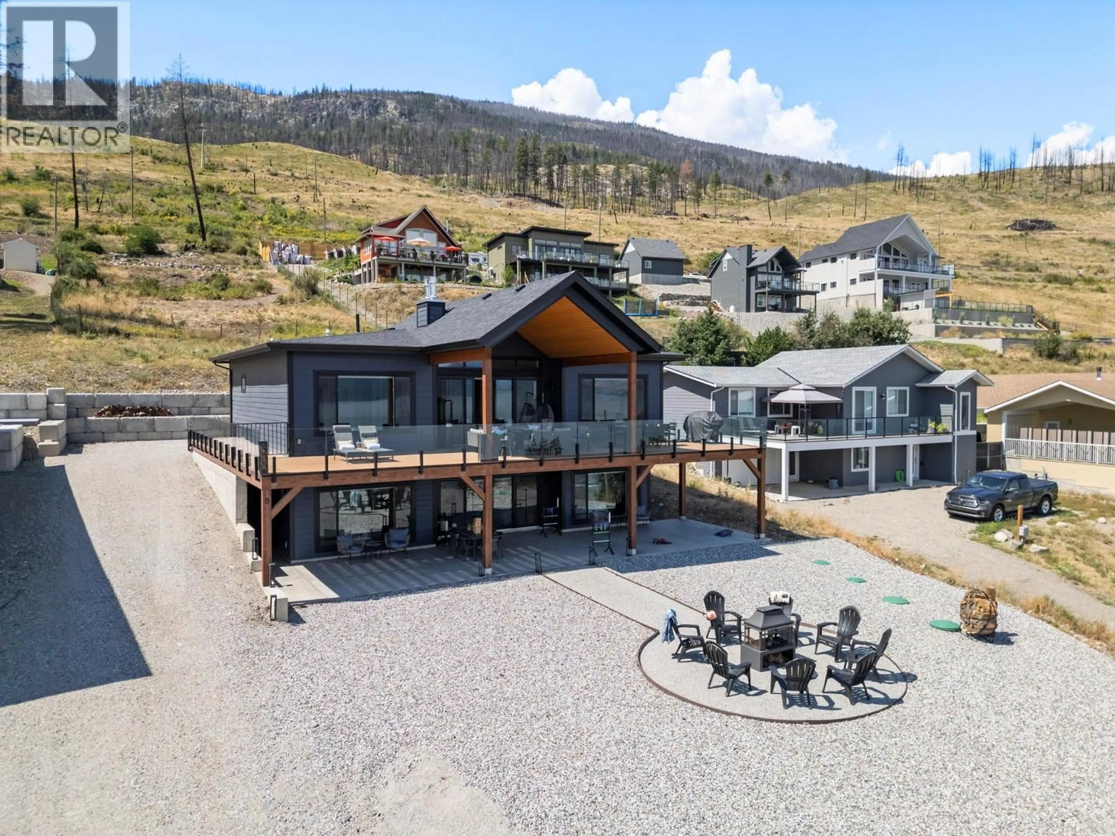 A pic from outside/outdoor area/front of a property/back of a property/a pic from drone, mountain view for 8 KENYON ROAD, Vernon British Columbia V1H2C6