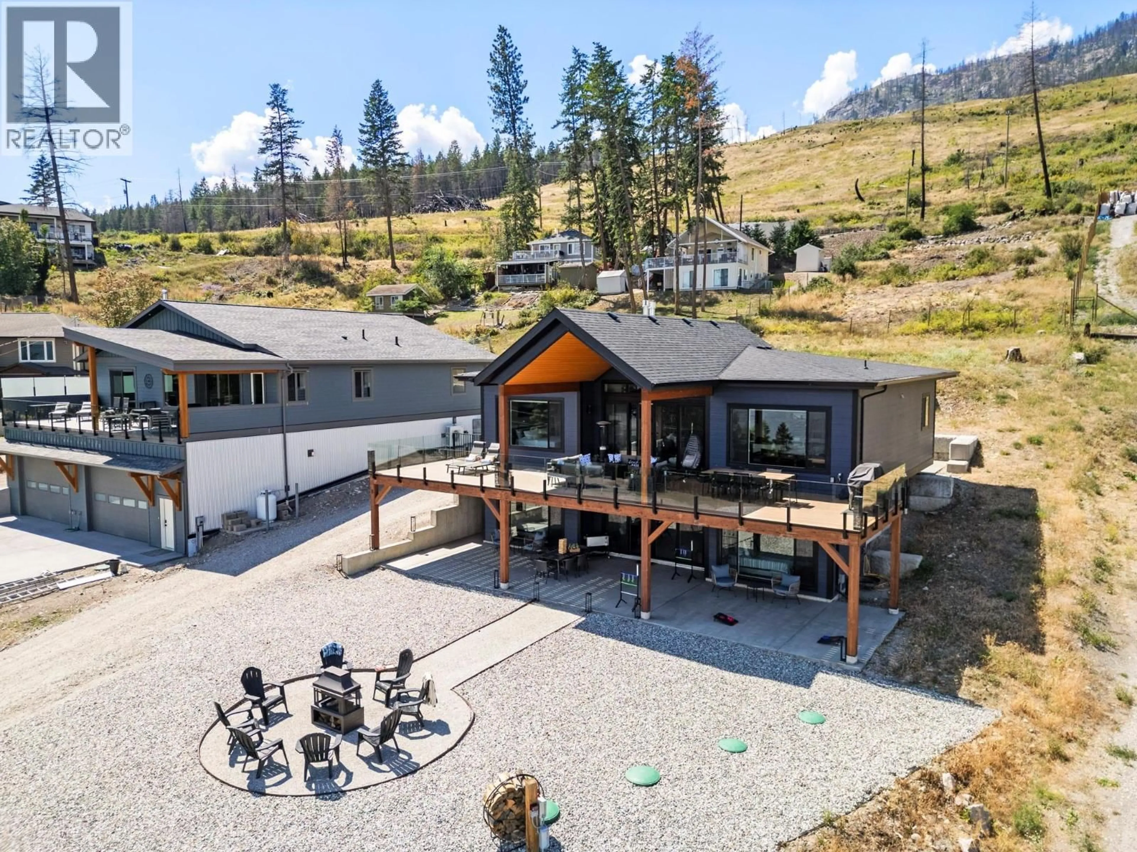 A pic from outside/outdoor area/front of a property/back of a property/a pic from drone, mountain view for 8 KENYON ROAD, Vernon British Columbia V1H2C6