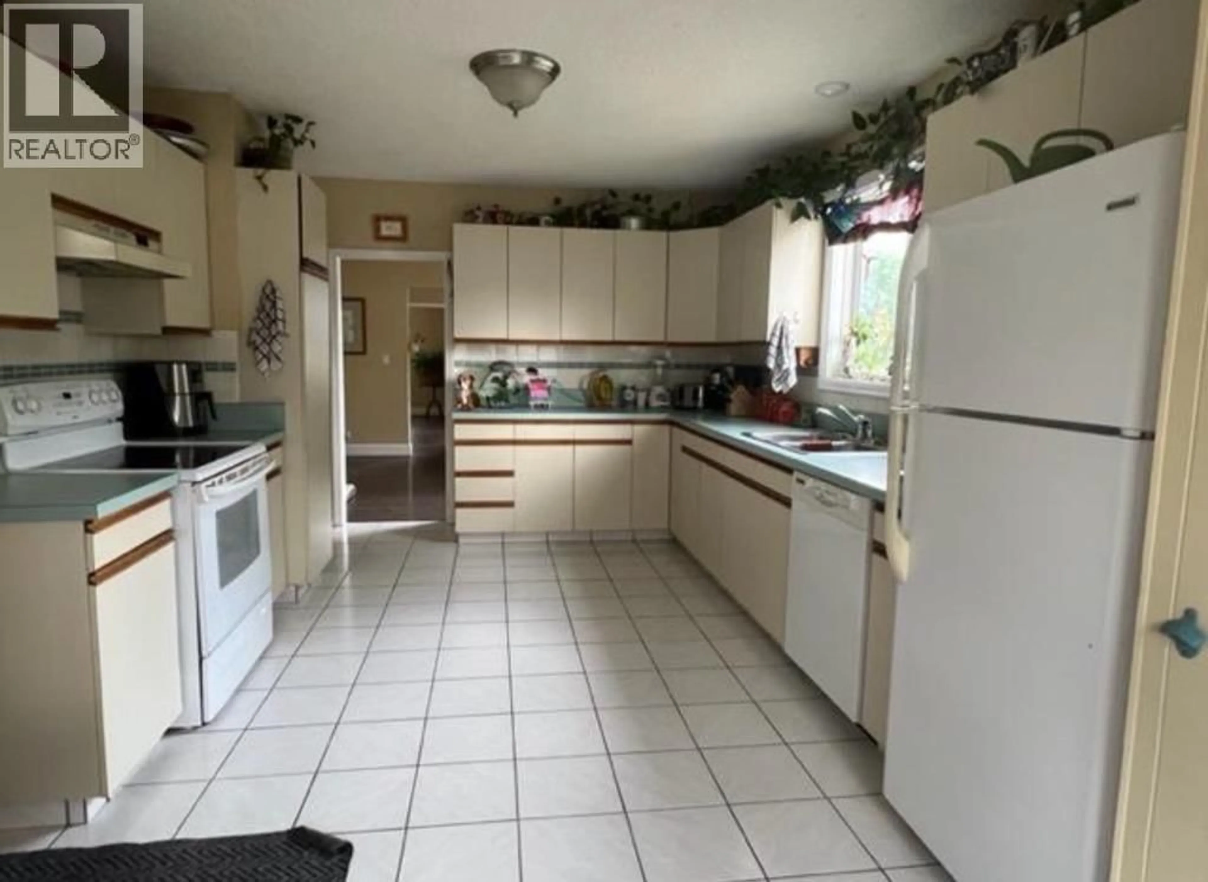 Standard kitchen, ceramic/tile floor for 8503 72ND AVENUE, Osoyoos British Columbia V0H1V2