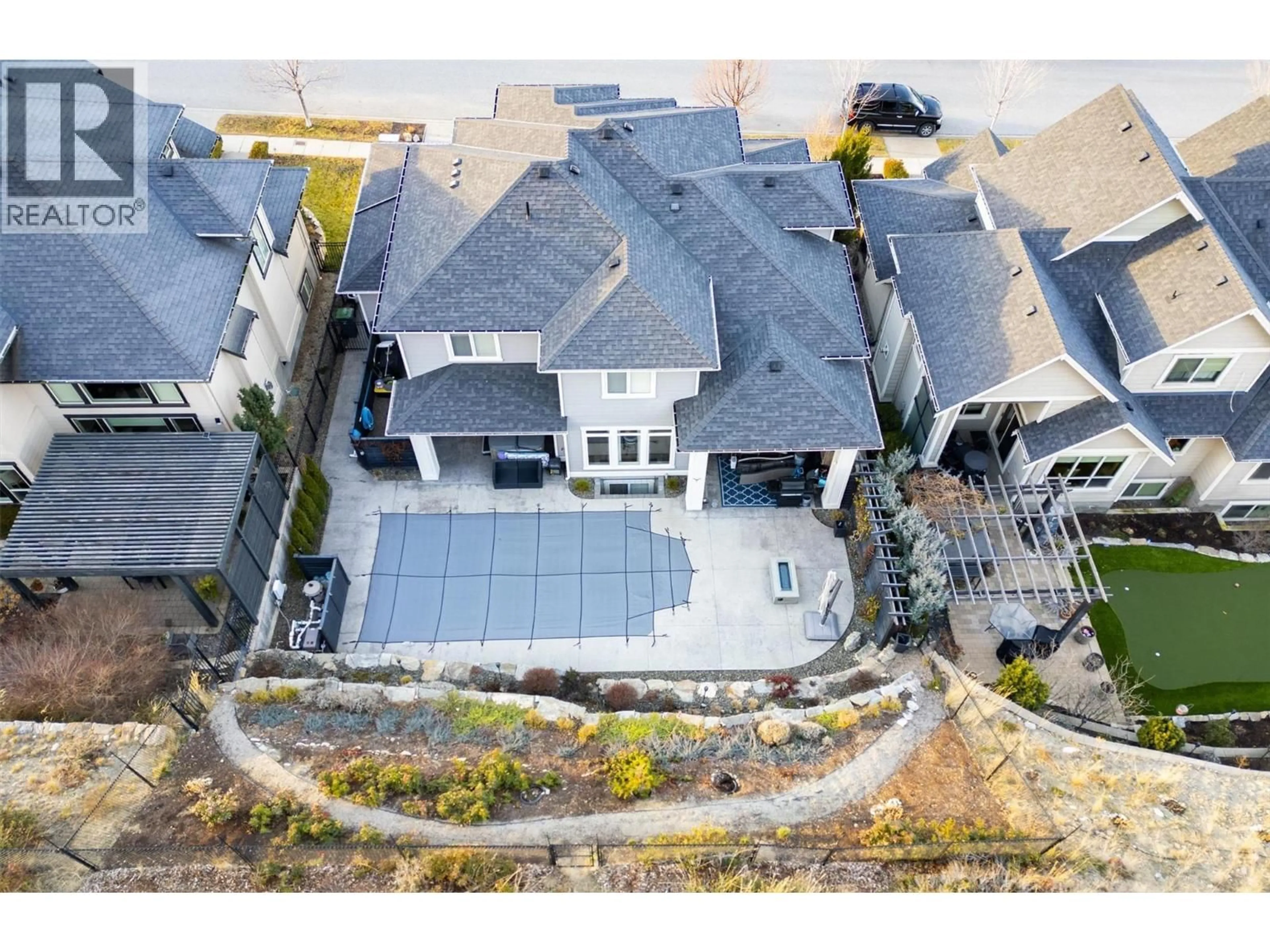 A pic from outside/outdoor area/front of a property/back of a property/a pic from drone, street for 5499 MOUNTAINSIDE DRIVE, Kelowna British Columbia V1W5G4