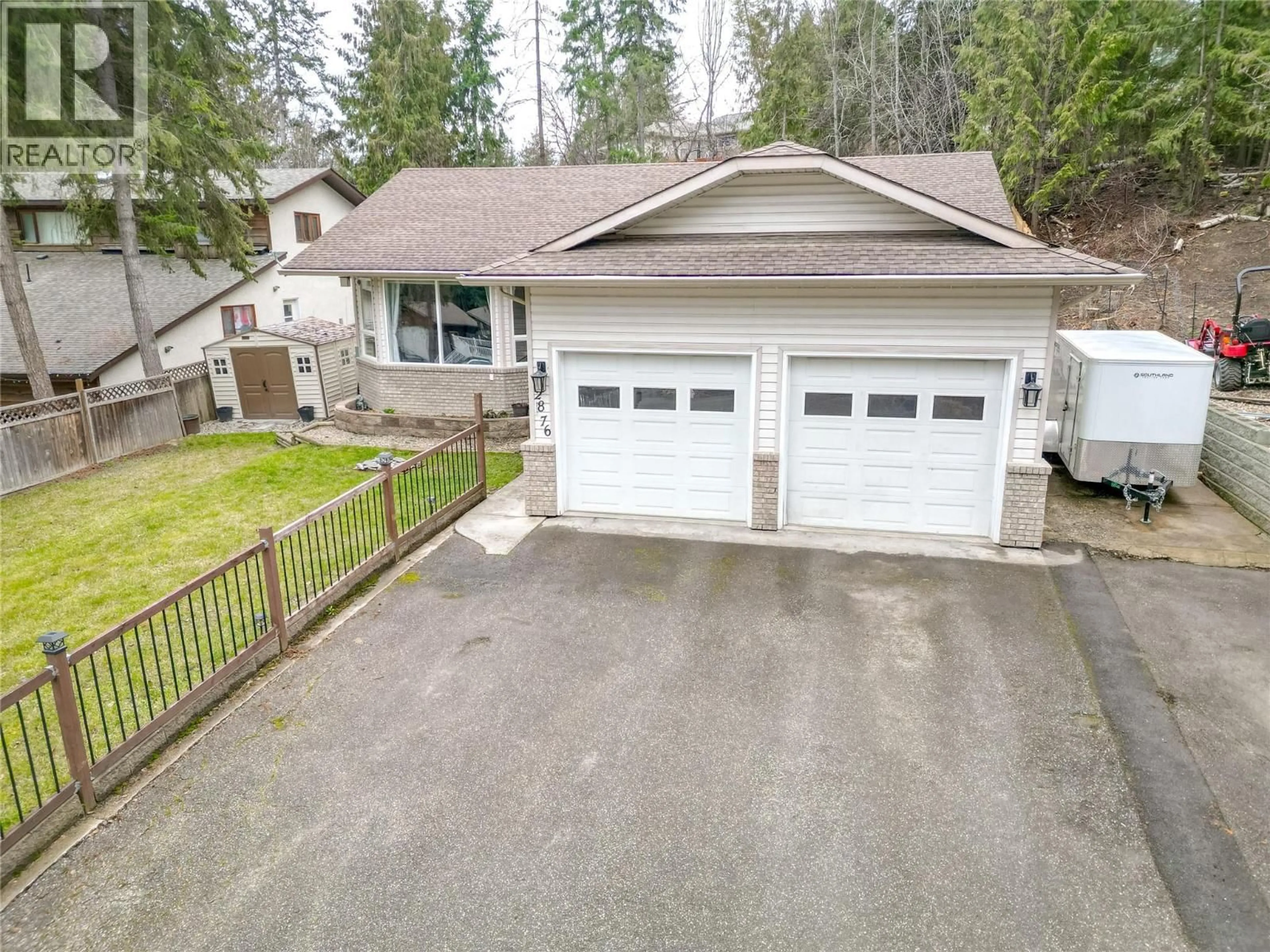 A pic from outside/outdoor area/front of a property/back of a property/a pic from drone, street for 2876 JUNIPER CRESCENT, Blind Bay British Columbia V0E2W2