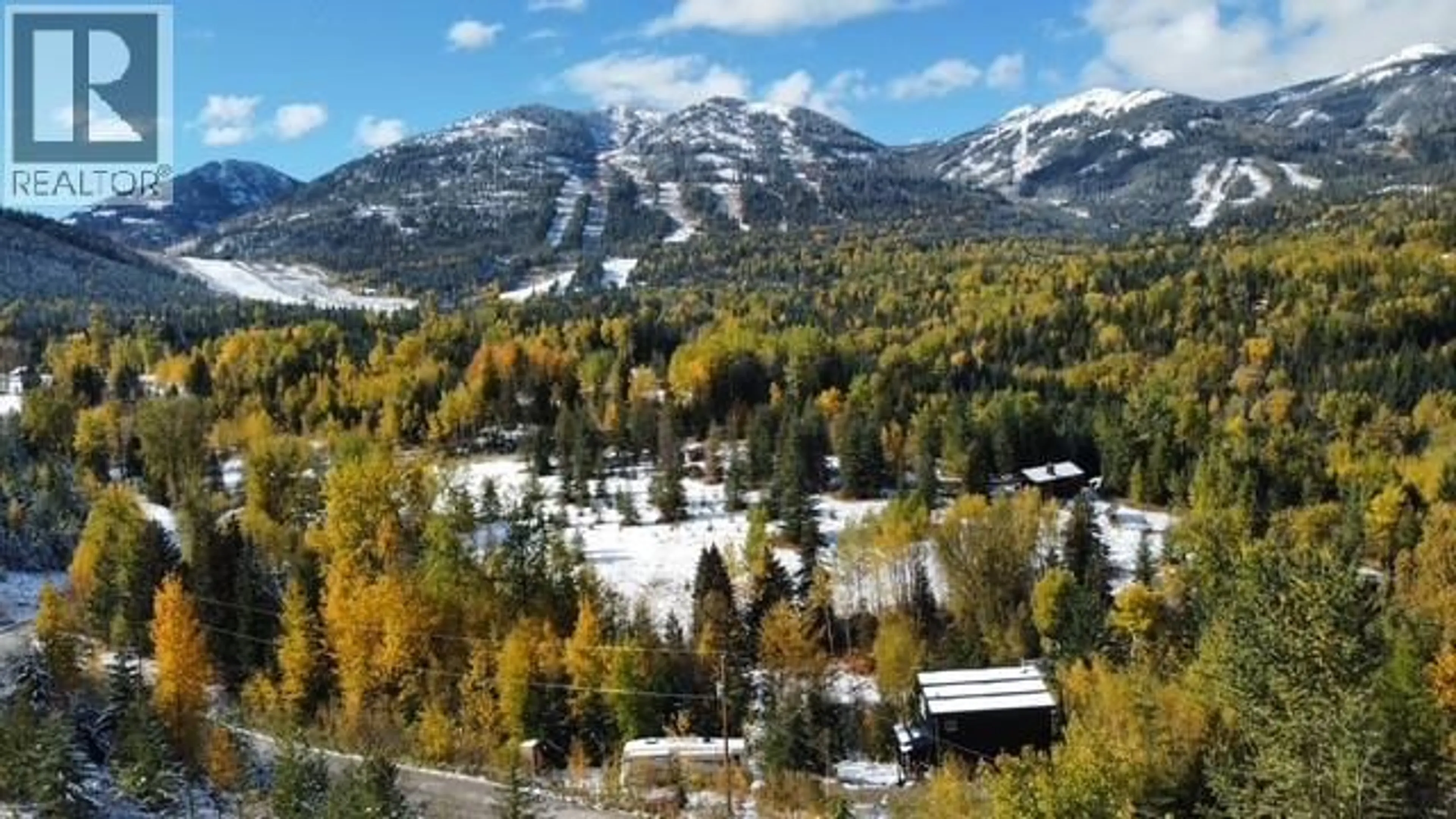 A pic from outside/outdoor area/front of a property/back of a property/a pic from drone, mountain view for 300 RICHIE ROAD, Rossland British Columbia V0G1Y0