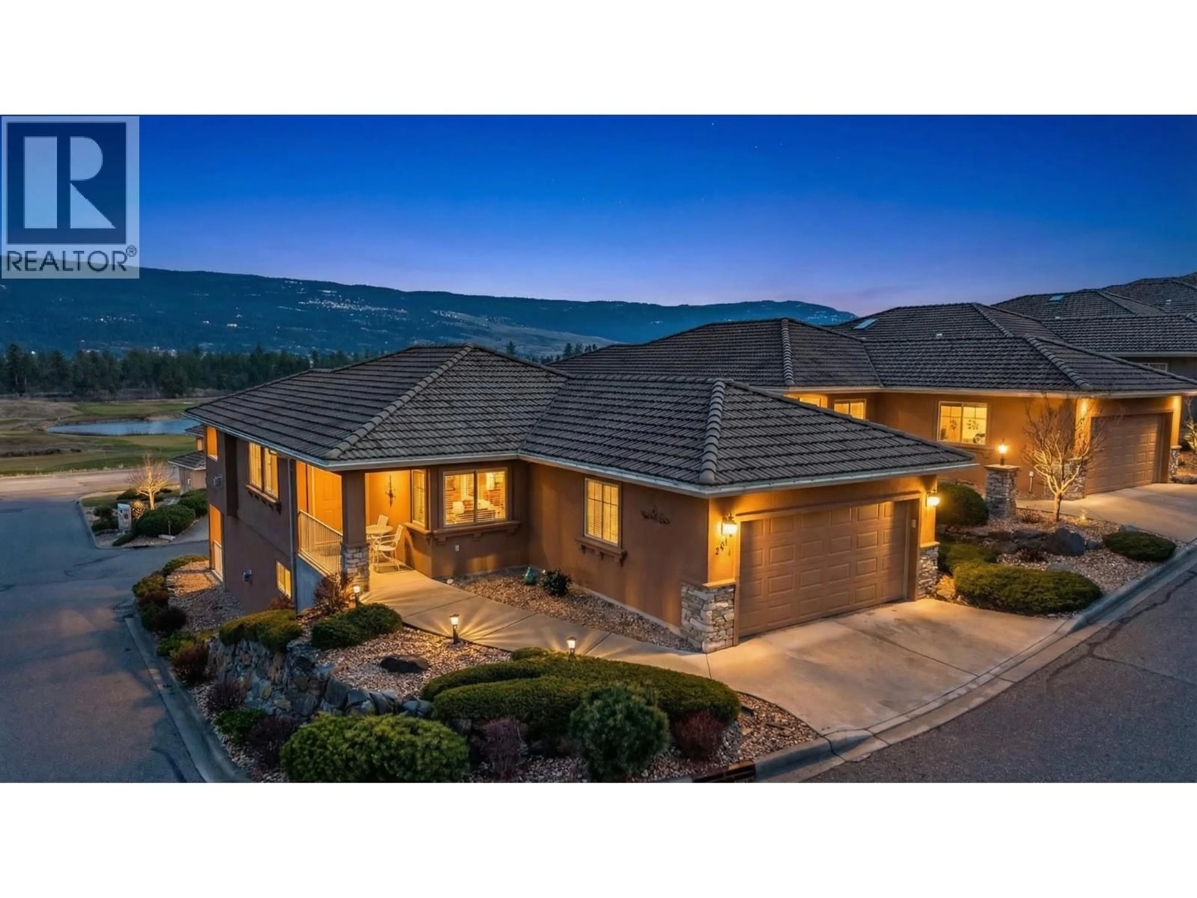 A pic from outside/outdoor area/front of a property/back of a property/a pic from drone, mountain view for 201 - 2455 QUAIL RIDGE BOULEVARD, Kelowna British Columbia V1V2S8