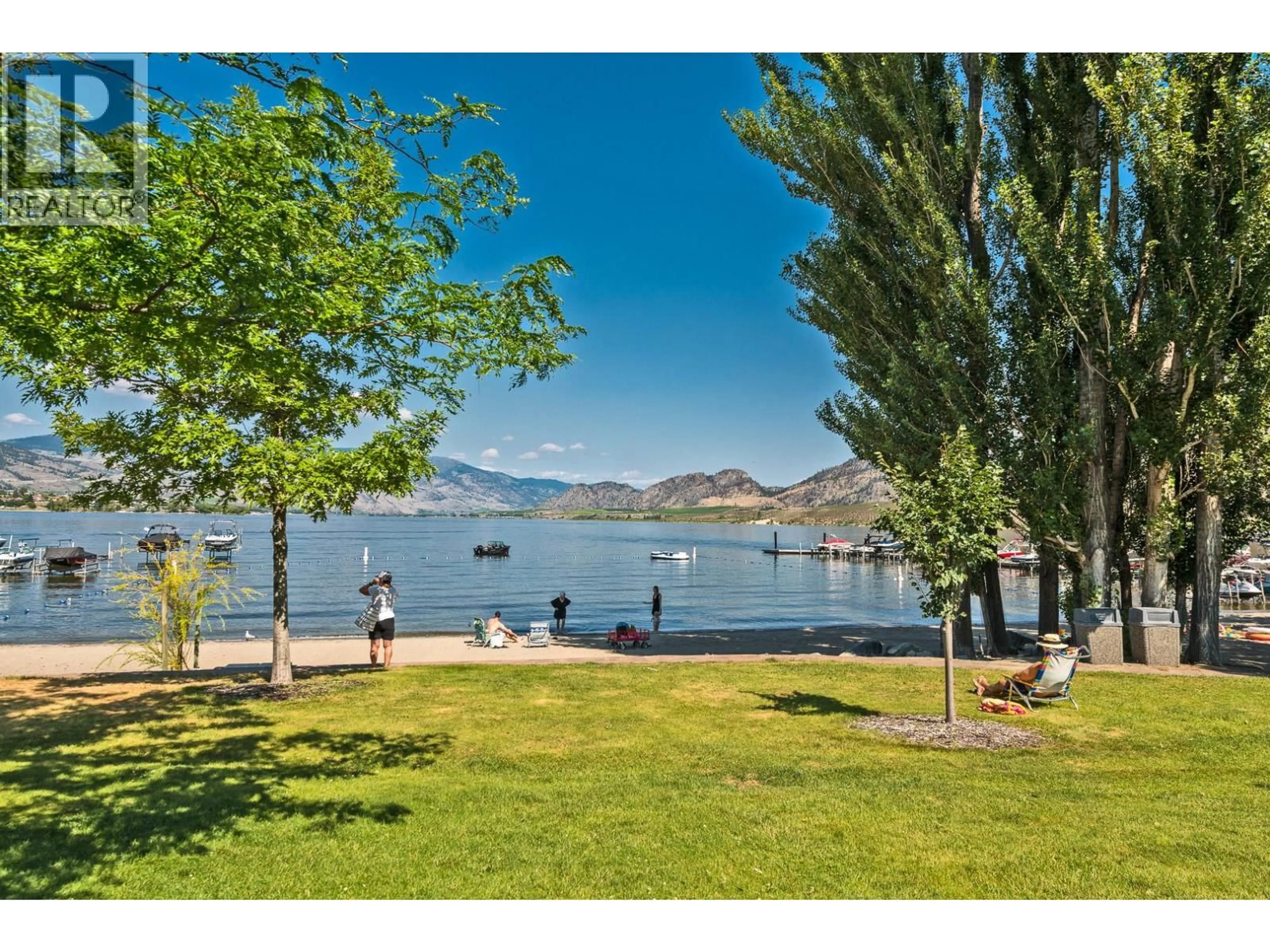 A pic from outside/outdoor area/front of a property/back of a property/a pic from drone, water/lake/river/ocean view for 432 - 7600 COTTONWOOD DRIVE, Osoyoos British Columbia V0H1V3