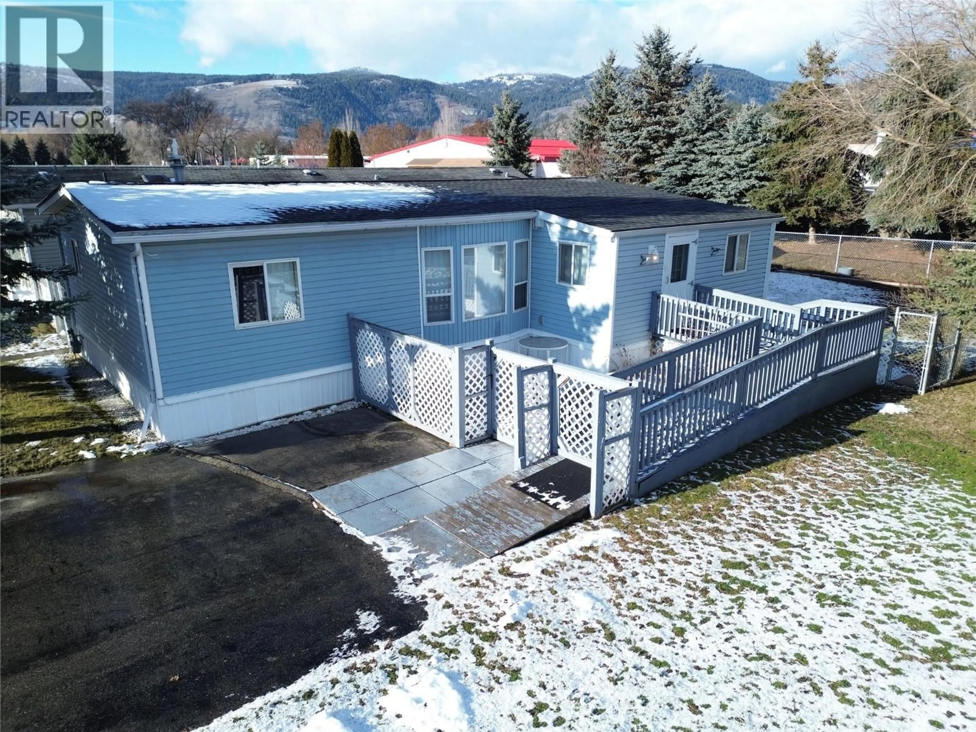 A pic from outside/outdoor area/front of a property/back of a property/a pic from drone, mountain view for 10 - 7225 BOUNDARY DRIVE, Grand Forks British Columbia V0H1H0