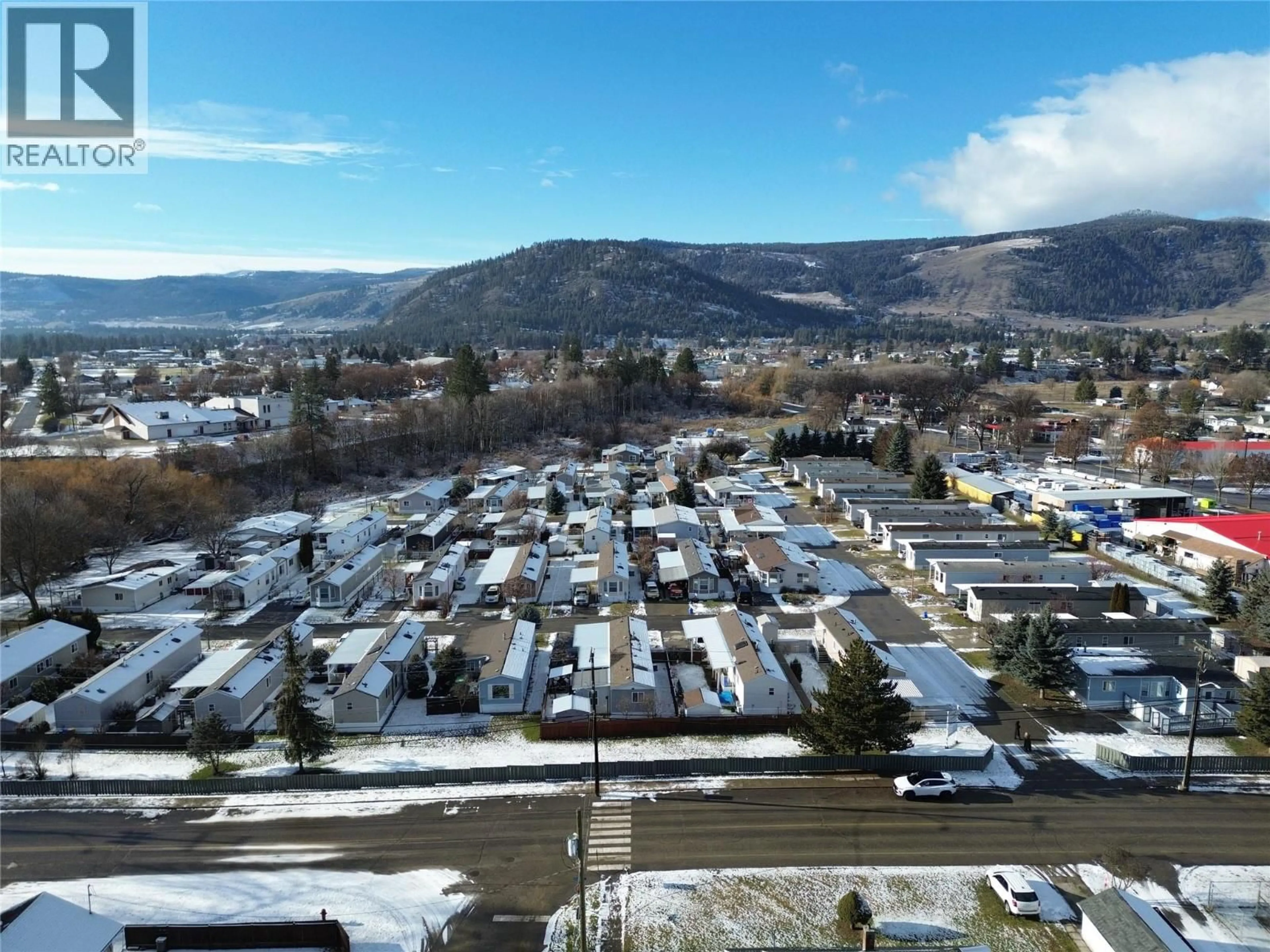A pic from outside/outdoor area/front of a property/back of a property/a pic from drone, mountain view for 10 - 7225 BOUNDARY DRIVE, Grand Forks British Columbia V0H1H0