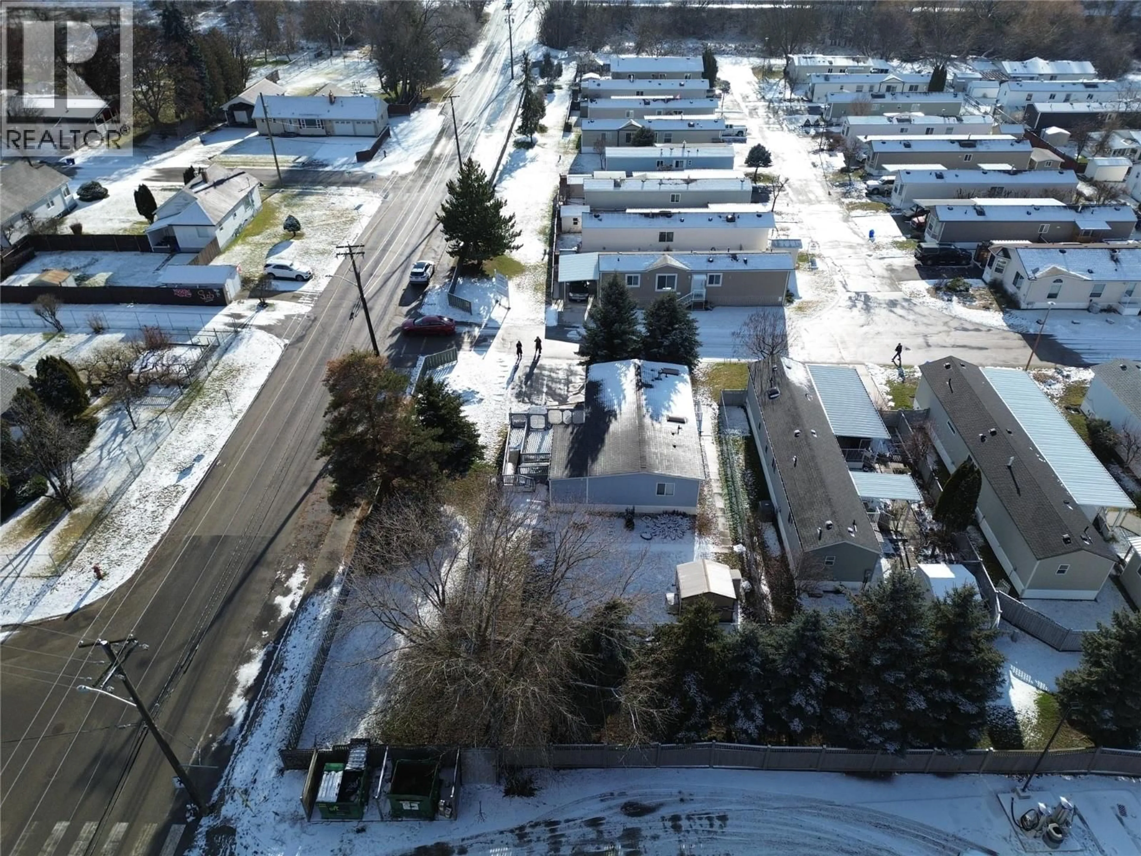 A pic from outside/outdoor area/front of a property/back of a property/a pic from drone, street for 10 - 7225 BOUNDARY DRIVE, Grand Forks British Columbia V0H1H0
