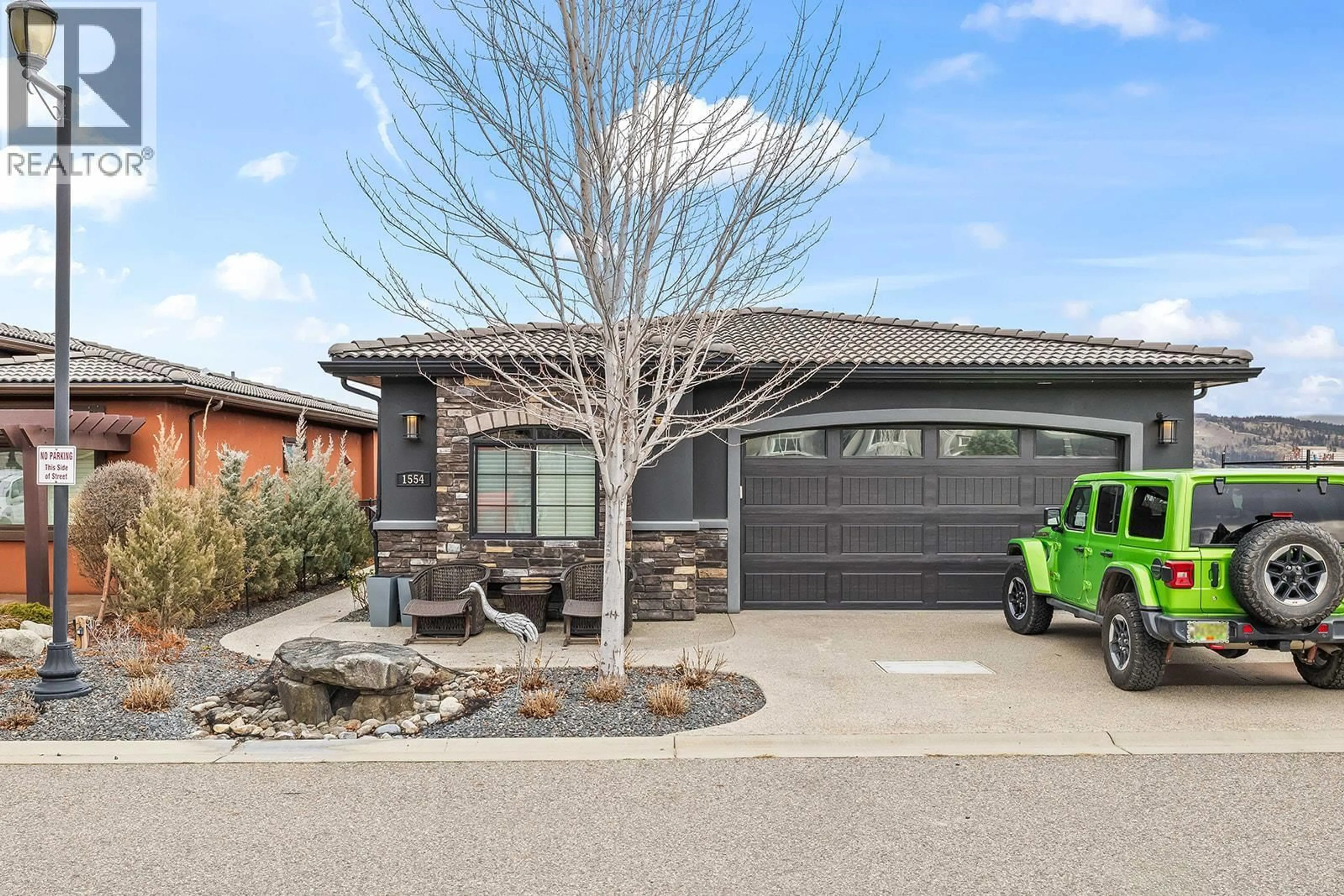 Home with brick exterior material, street for 1554 HARBOUR GREEN ROAD, West Kelowna British Columbia V1Z4E1