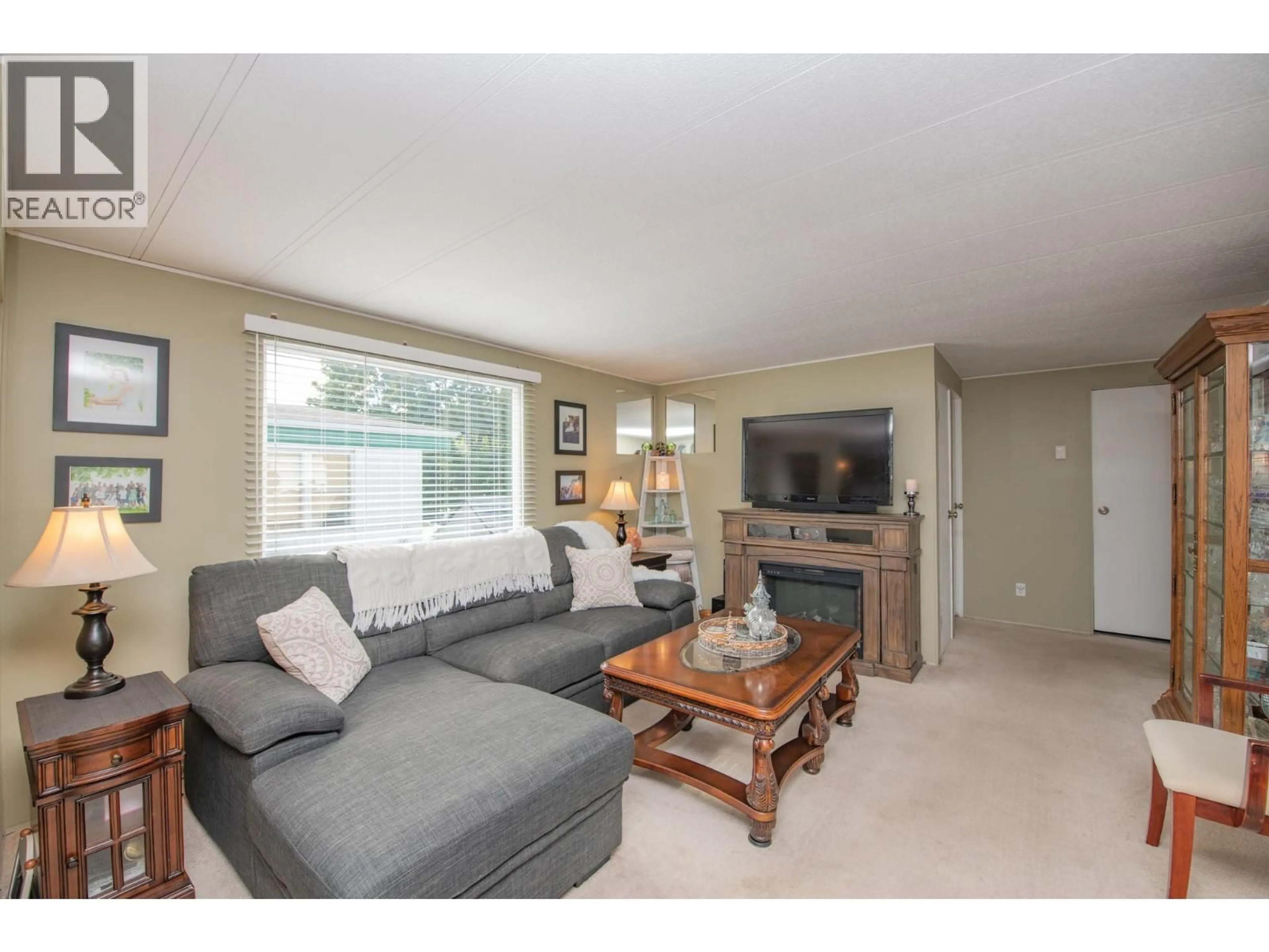 Living room with furniture, unknown for 3A - 15401 KALAMALKA LAKE ROAD, Coldstream British Columbia V1B1Z3