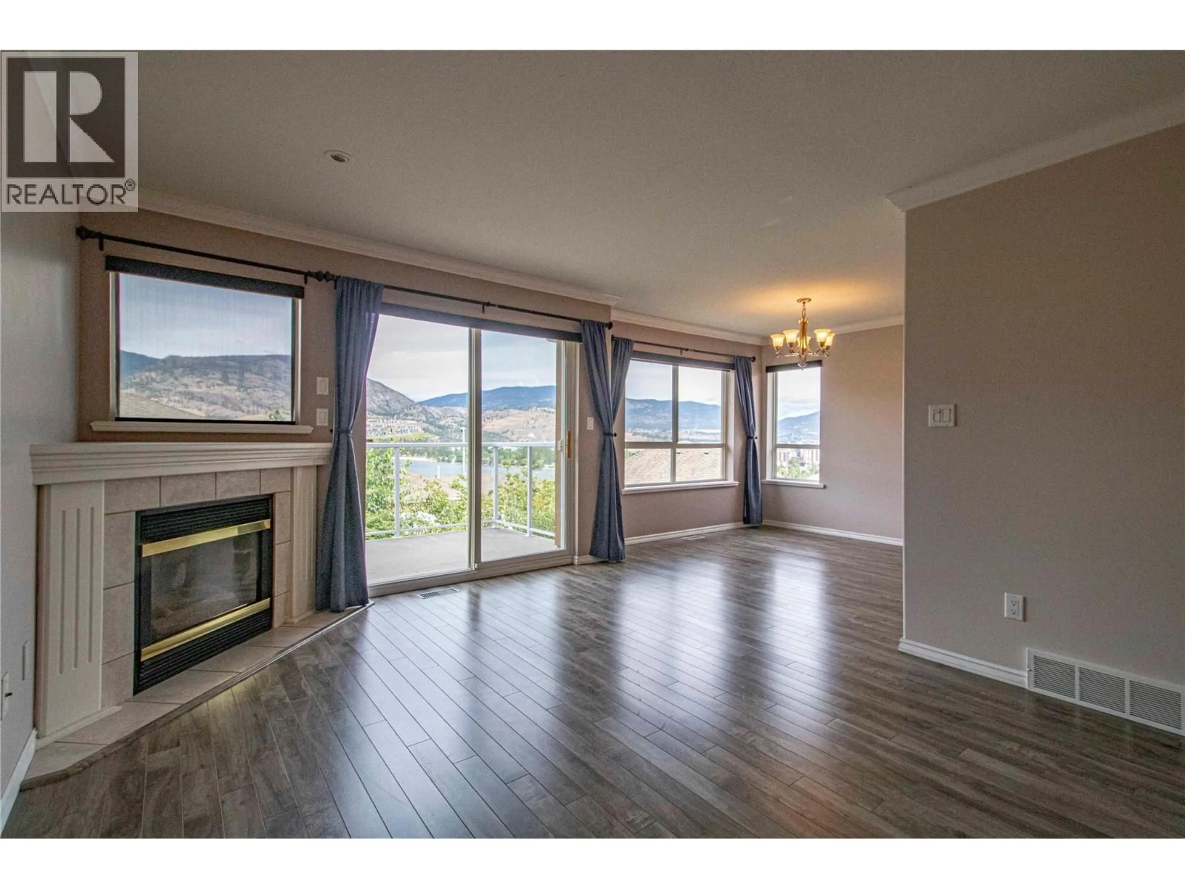 Living room with furniture, wood/laminate floor for 145 - 3948 FINNERTY ROAD, Penticton British Columbia V2A8P8