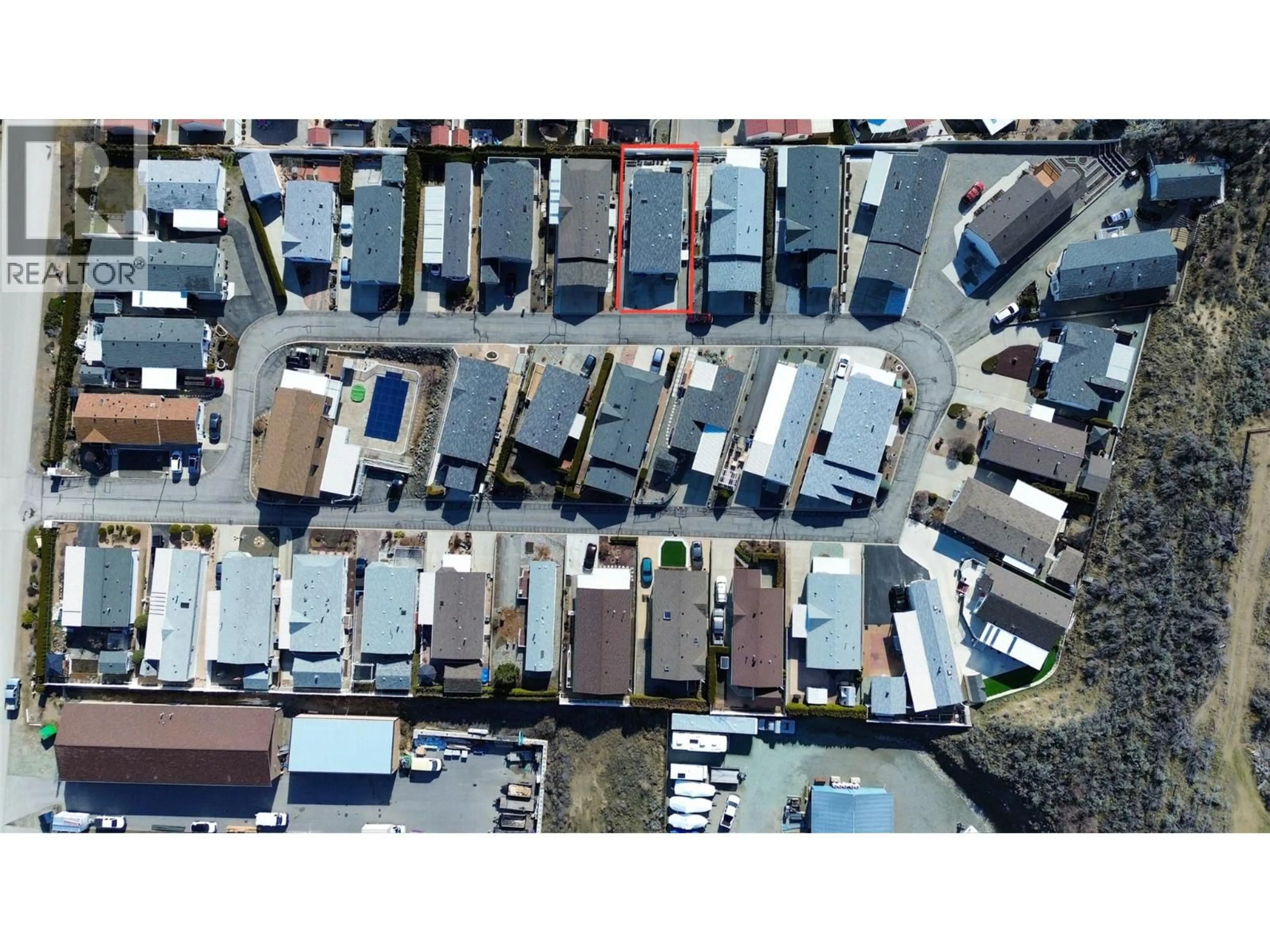 A pic from outside/outdoor area/front of a property/back of a property/a pic from drone, street for 22 - 9410 115TH STREET, Osoyoos British Columbia V0H1V5