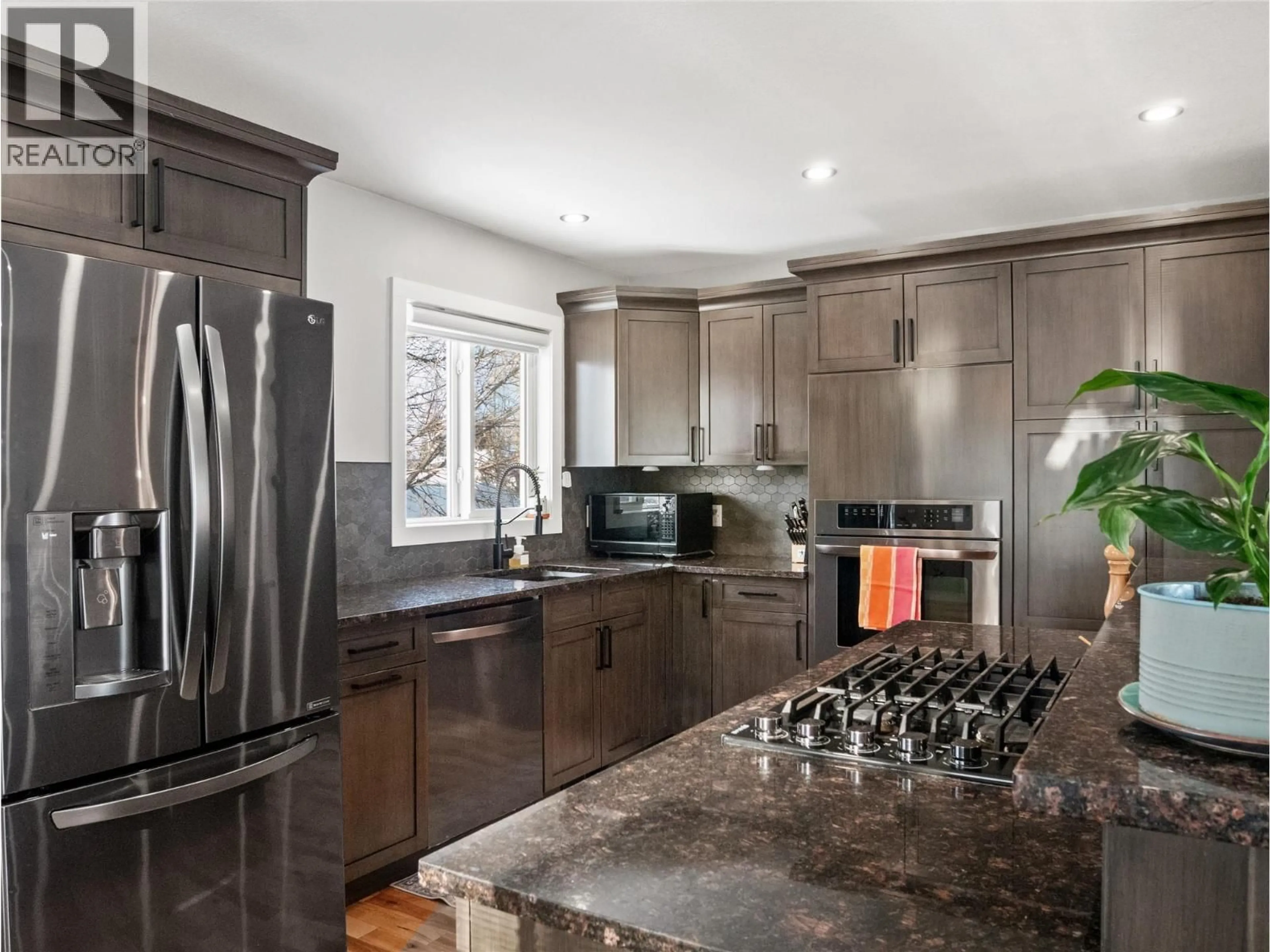 Open concept kitchen, unknown for 1500 105 AVENUE, Dawson Creek British Columbia V1G2M4