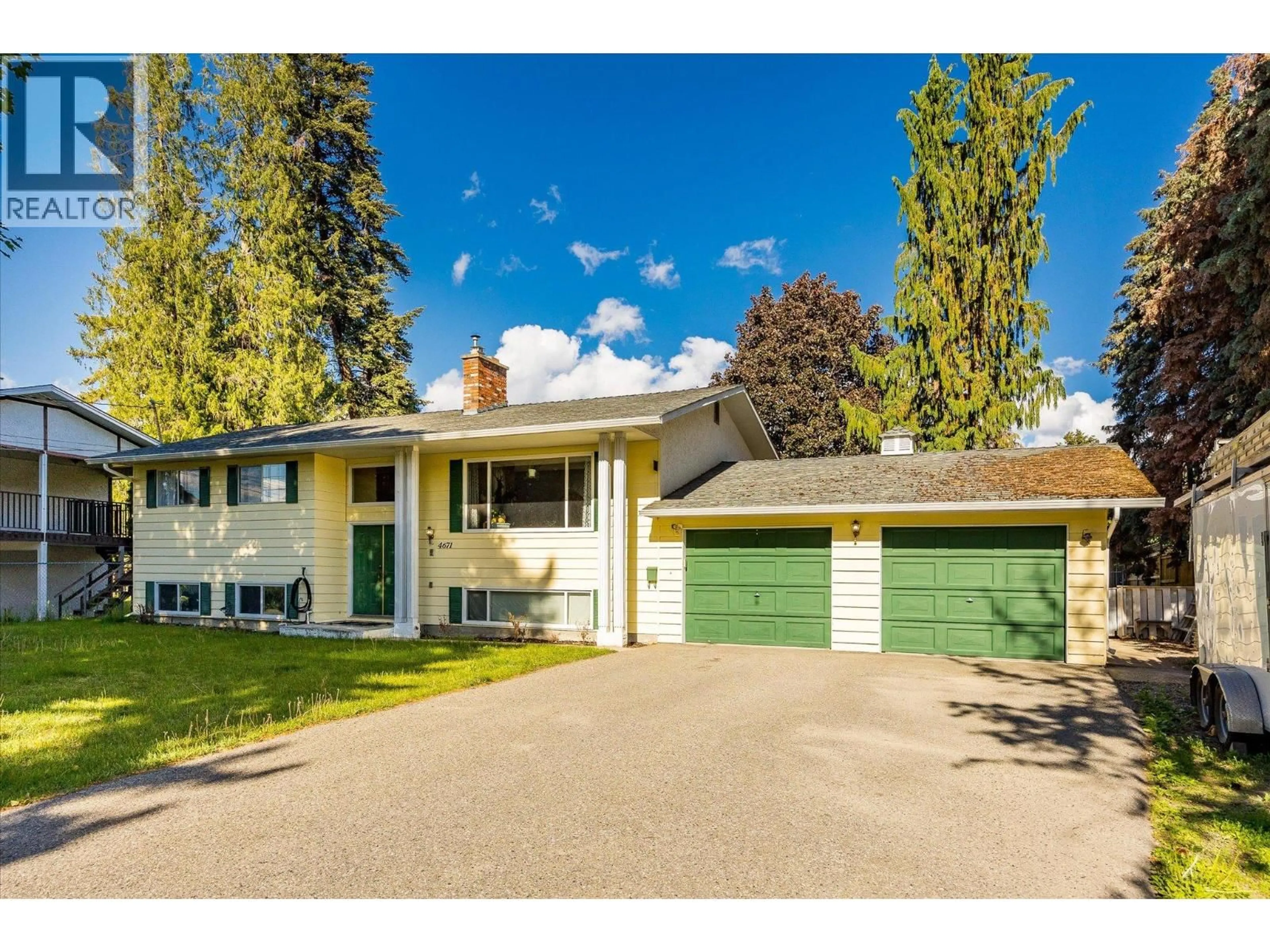 Home with vinyl exterior material, street for 4671 FORDHAM ROAD, Kelowna British Columbia V1W1P1