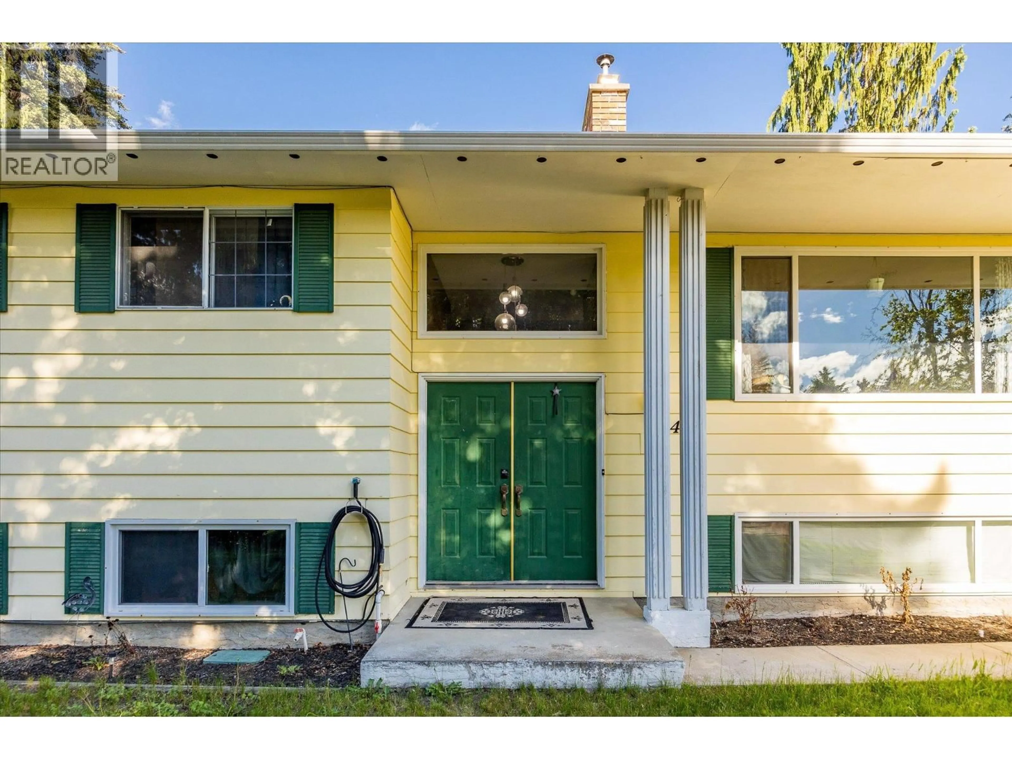 Home with vinyl exterior material, street for 4671 FORDHAM ROAD, Kelowna British Columbia V1W1P1