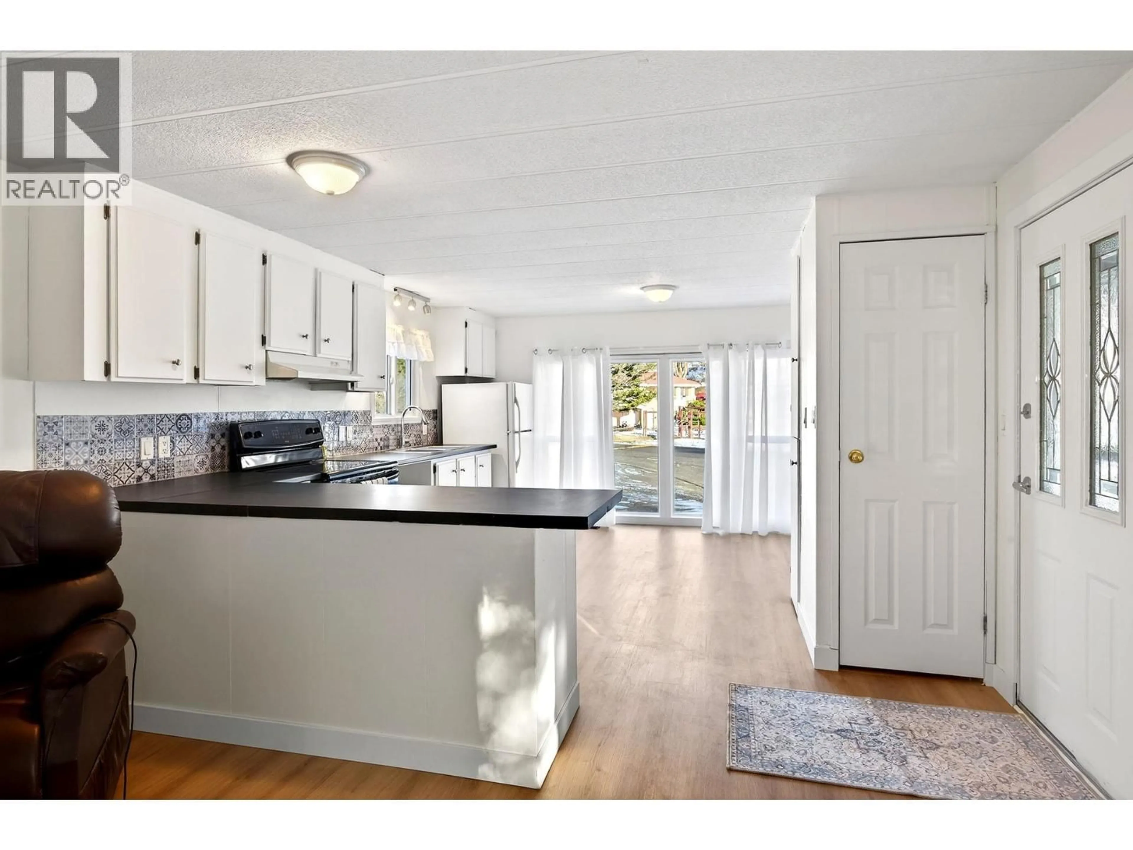 Open concept kitchen, unknown for 101 - 1175 ROSE HILL ROAD, Kamloops British Columbia V2E1G9