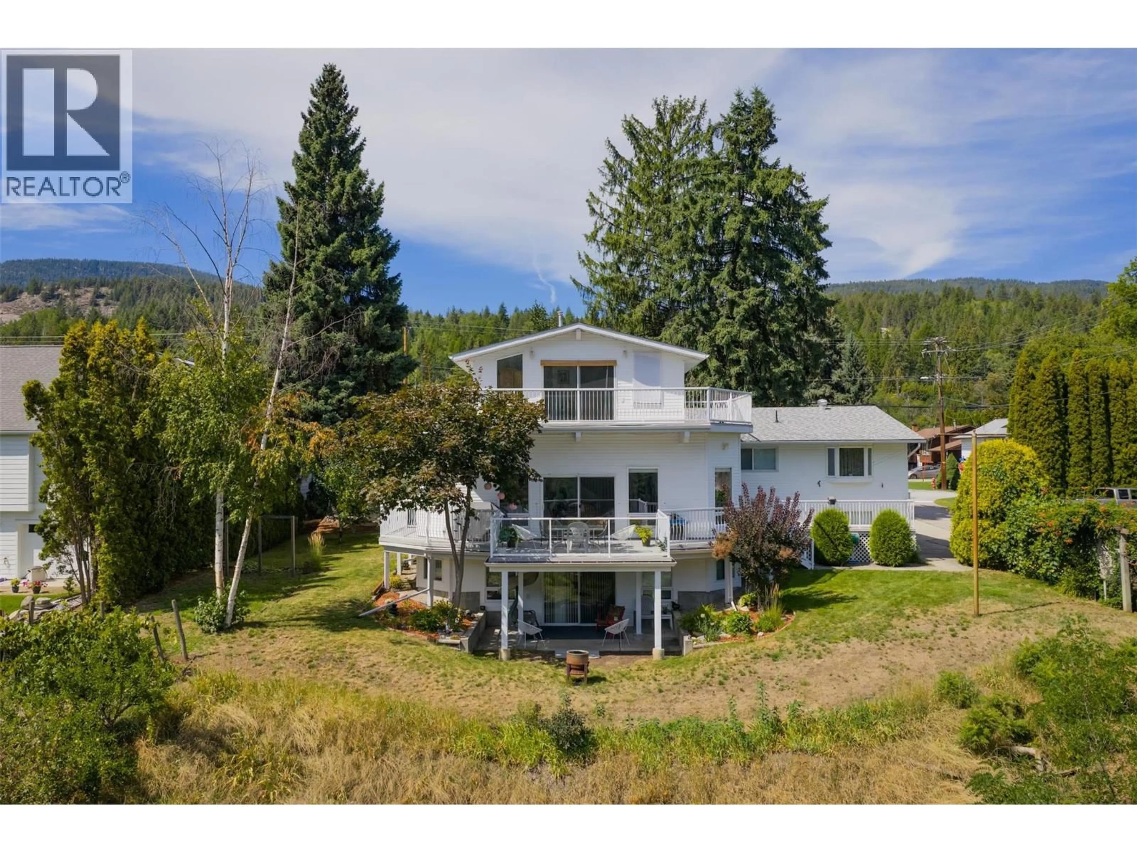 A pic from outside/outdoor area/front of a property/back of a property/a pic from drone, mountain view for 3101 4TH AVENUE, Castlegar British Columbia V1N2S5