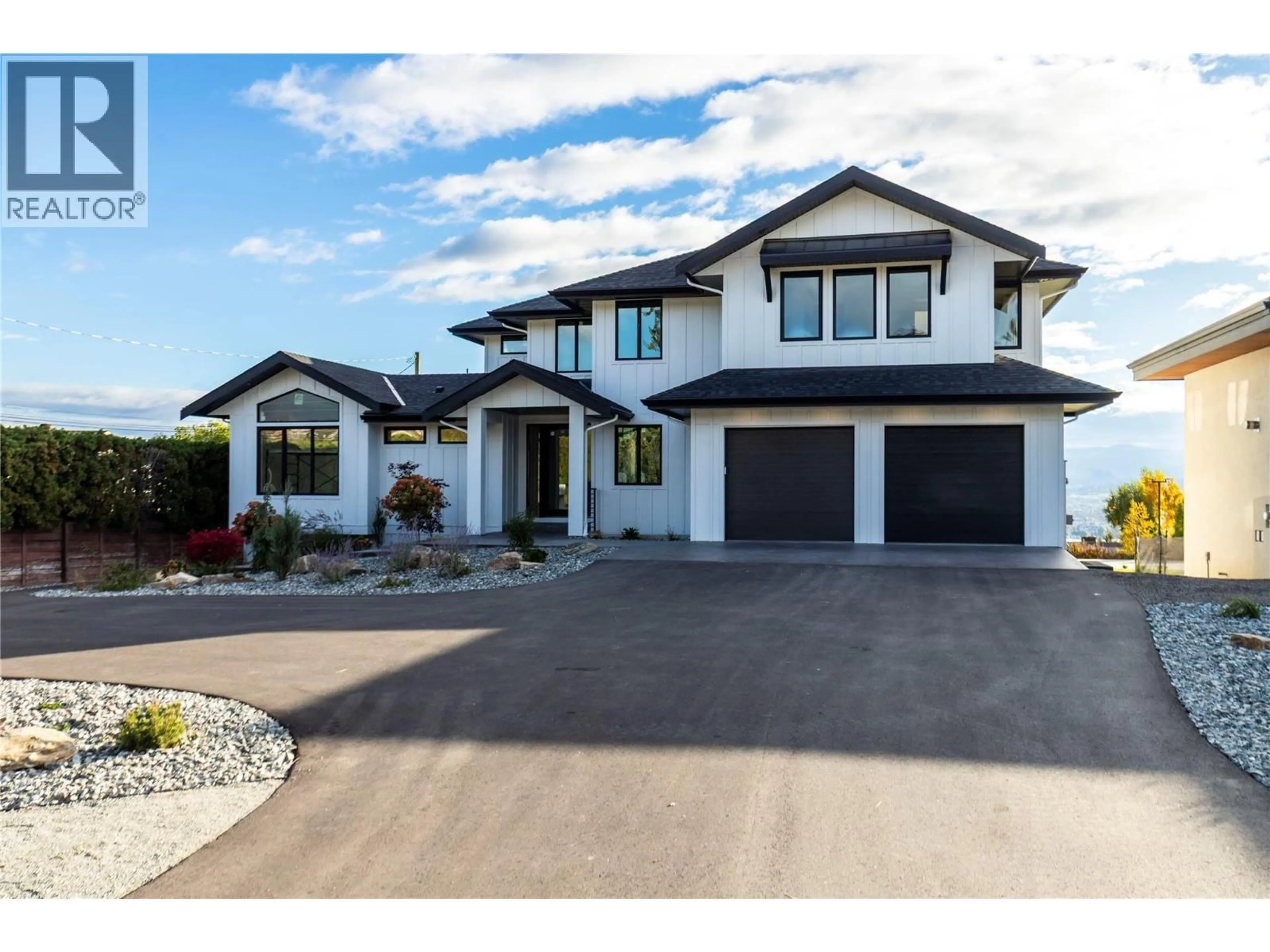 Home with brick exterior material, street for 2235 THACKER DRIVE, West Kelowna British Columbia V1Z1V5