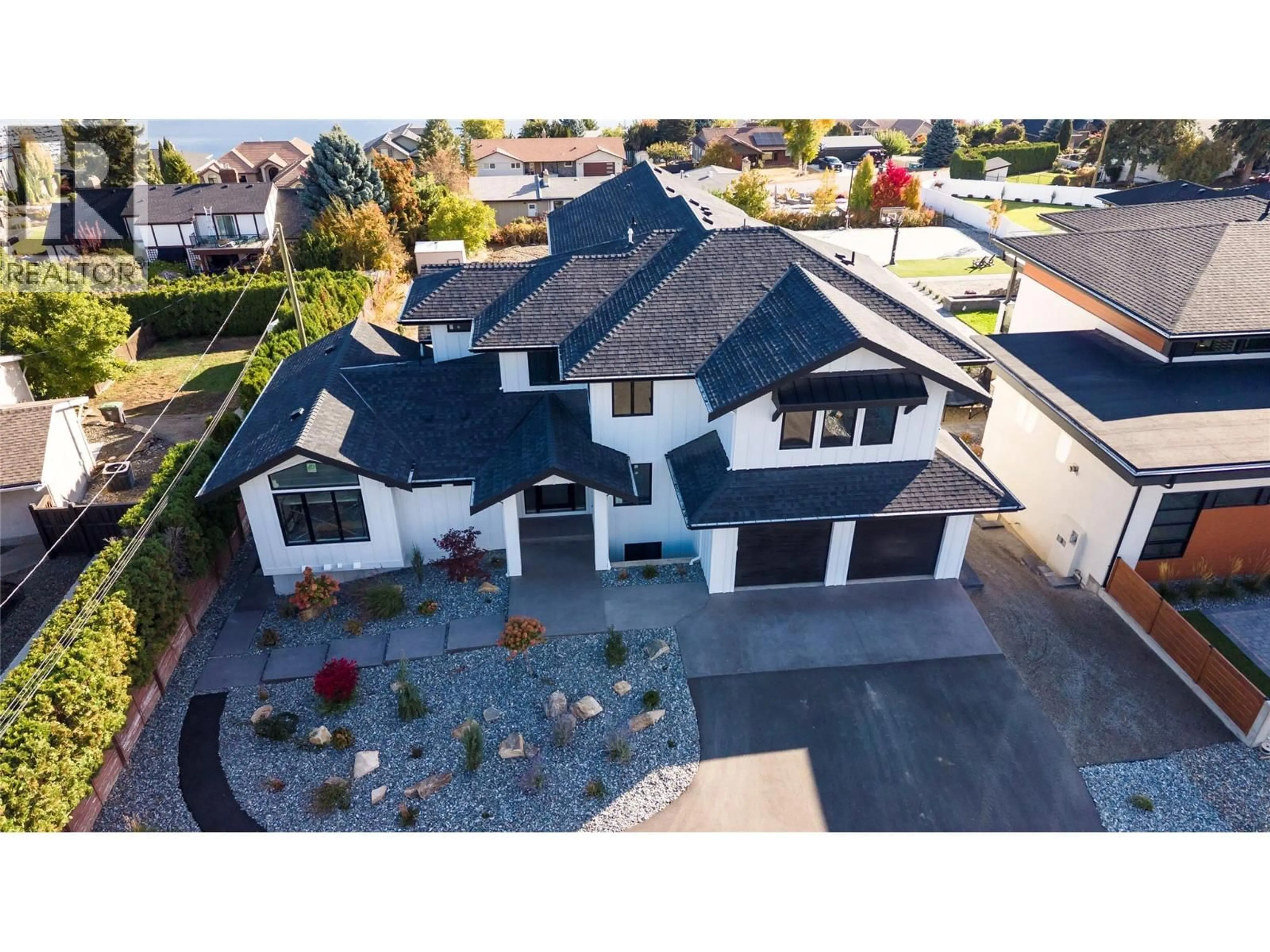 A pic from outside/outdoor area/front of a property/back of a property/a pic from drone, street for 2235 THACKER DRIVE, West Kelowna British Columbia V1Z1V5