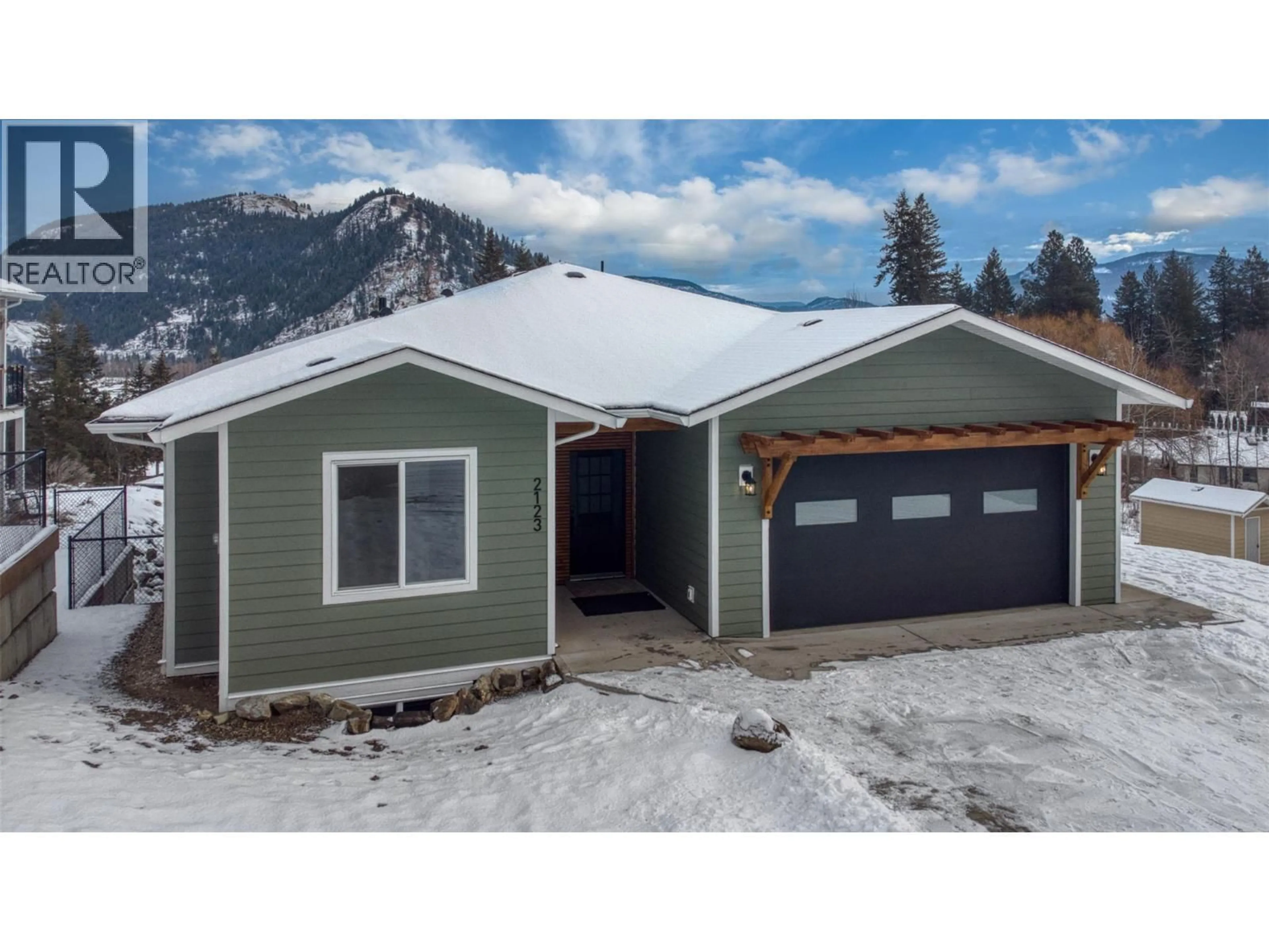 Home with vinyl exterior material, mountain view for 2123 MOUNTAIN VIEW AVENUE, Lumby British Columbia V0E2G0
