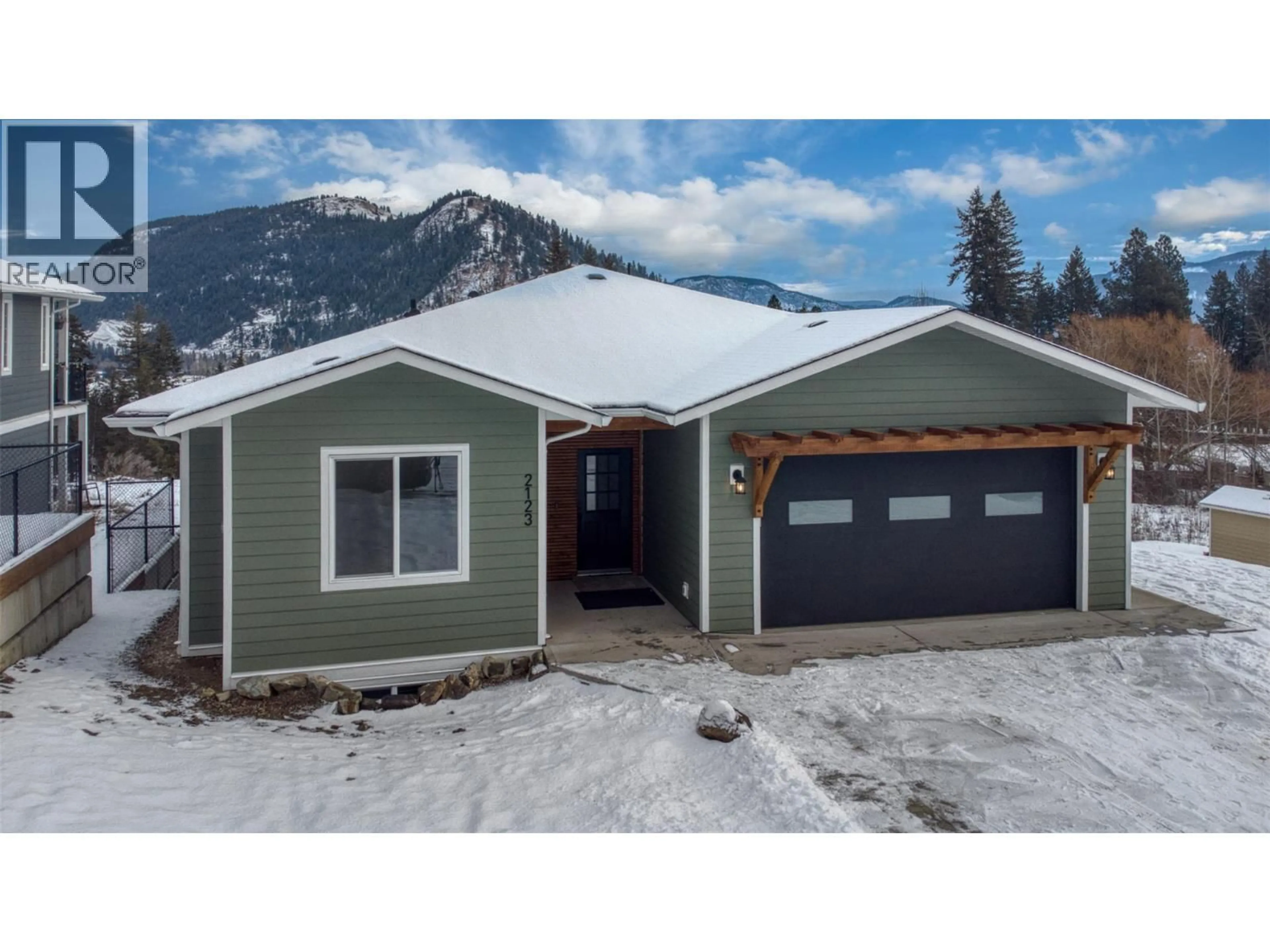Home with vinyl exterior material, mountain view for 2123 MOUNTAIN VIEW AVENUE, Lumby British Columbia V0E2G0