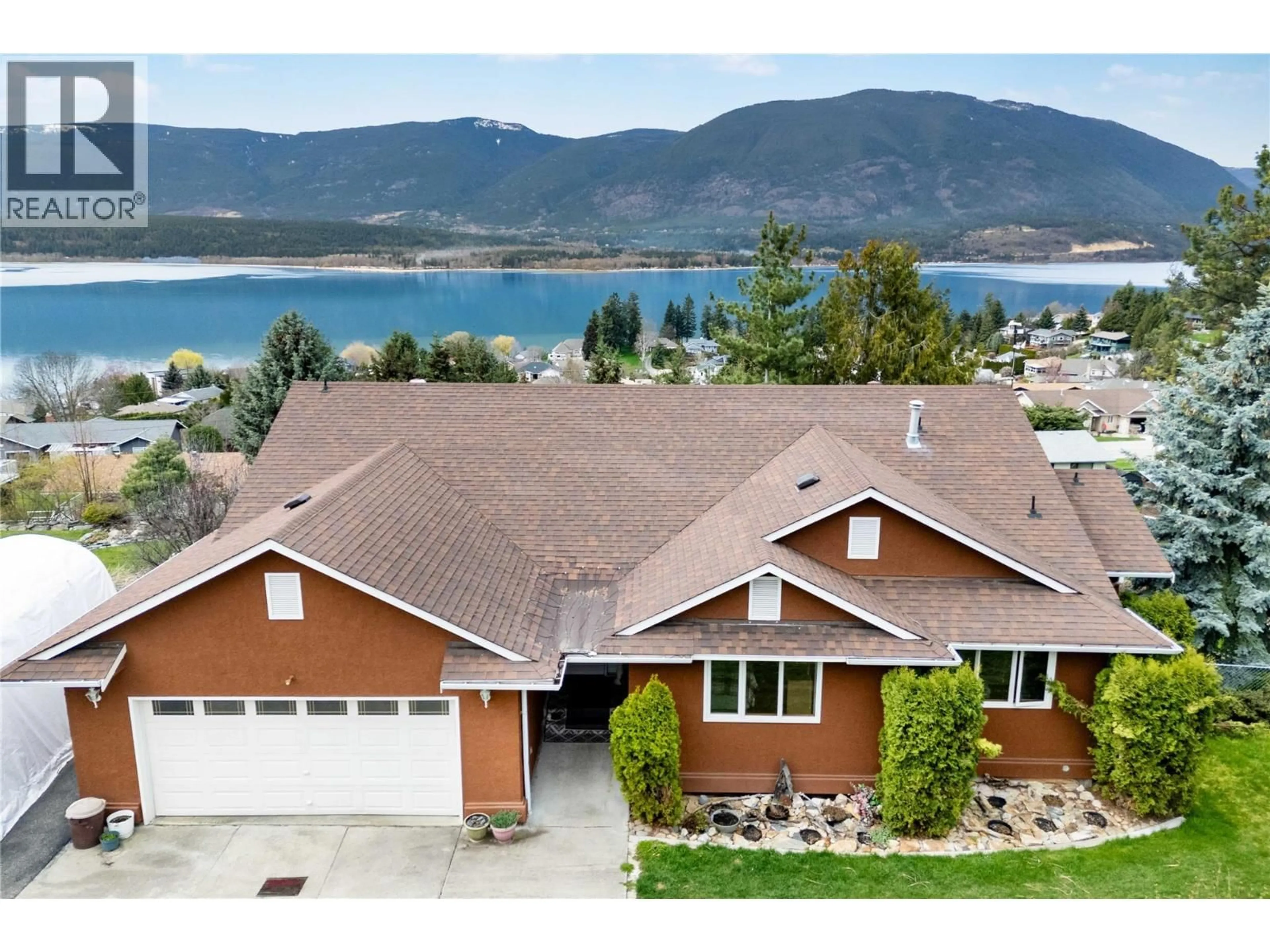 A pic from outside/outdoor area/front of a property/back of a property/a pic from drone, water/lake/river/ocean view for 4711 16 STREET NORTHEAST, Salmon Arm British Columbia V1E1E1