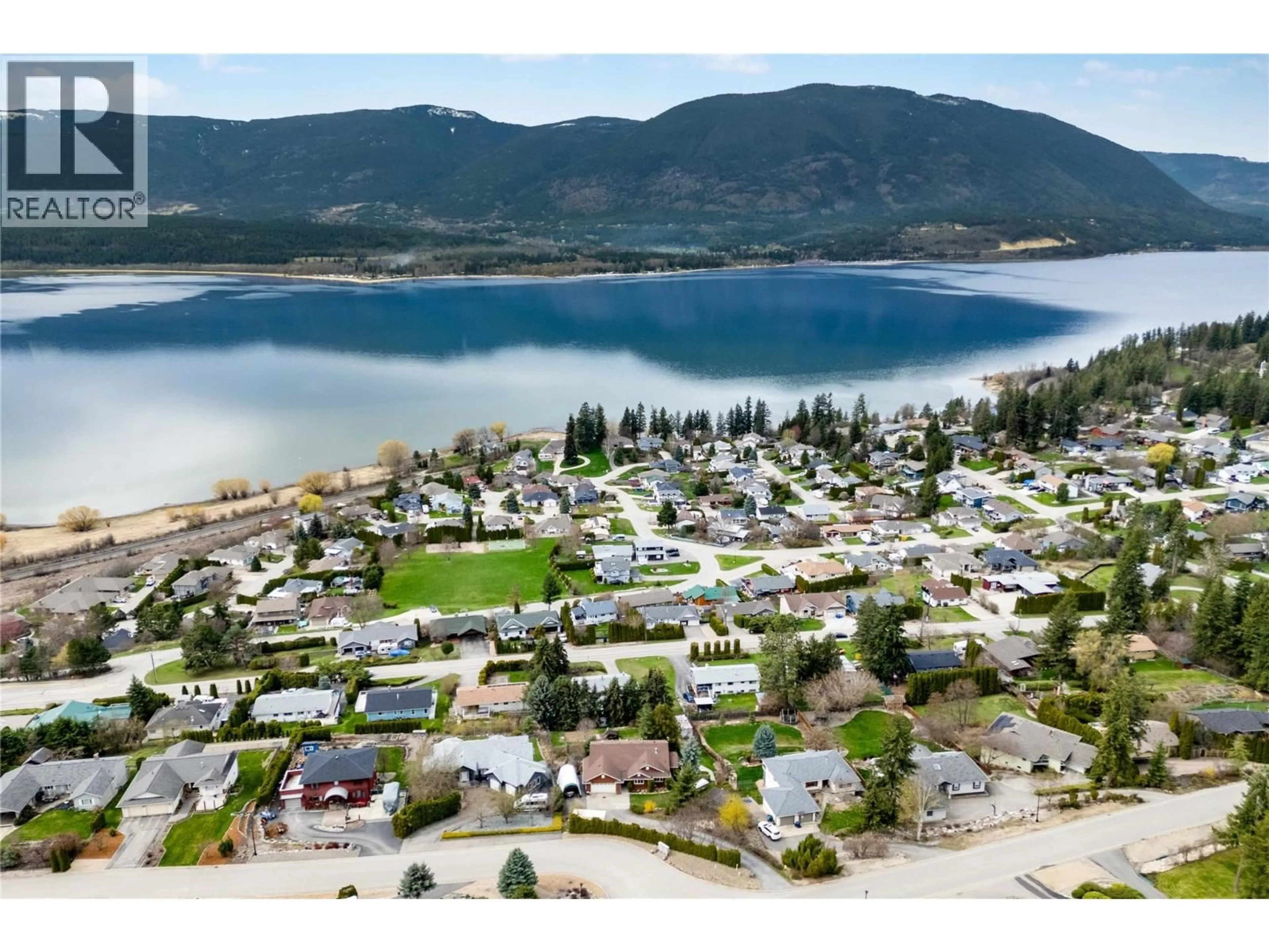 A pic from outside/outdoor area/front of a property/back of a property/a pic from drone, water/lake/river/ocean view for 4711 16 STREET NORTHEAST, Salmon Arm British Columbia V1E1E1