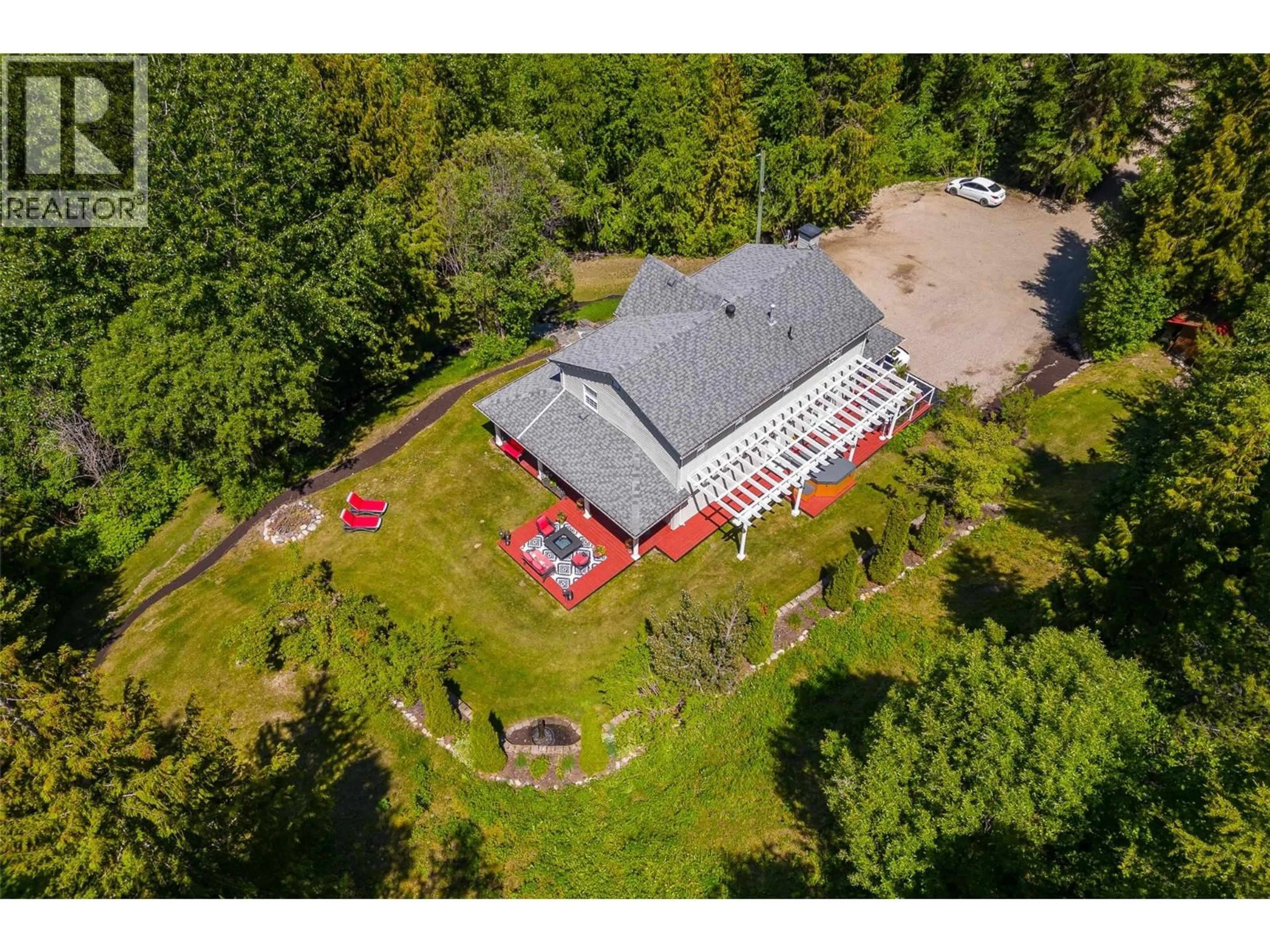 A pic from outside/outdoor area/front of a property/back of a property/a pic from drone, building for 8765 FORSBERG ROAD, Vernon British Columbia V1B3M6
