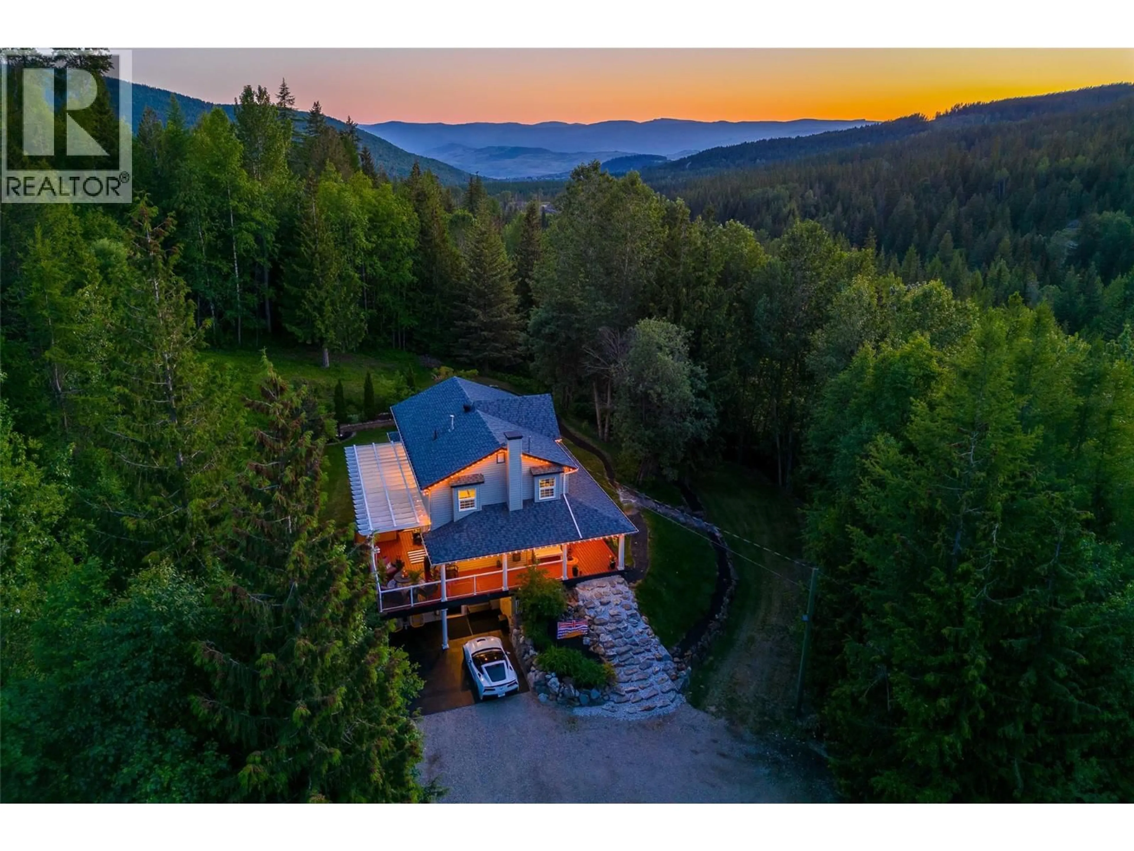 A pic from outside/outdoor area/front of a property/back of a property/a pic from drone, mountain view for 8765 FORSBERG ROAD, Vernon British Columbia V1B3M6